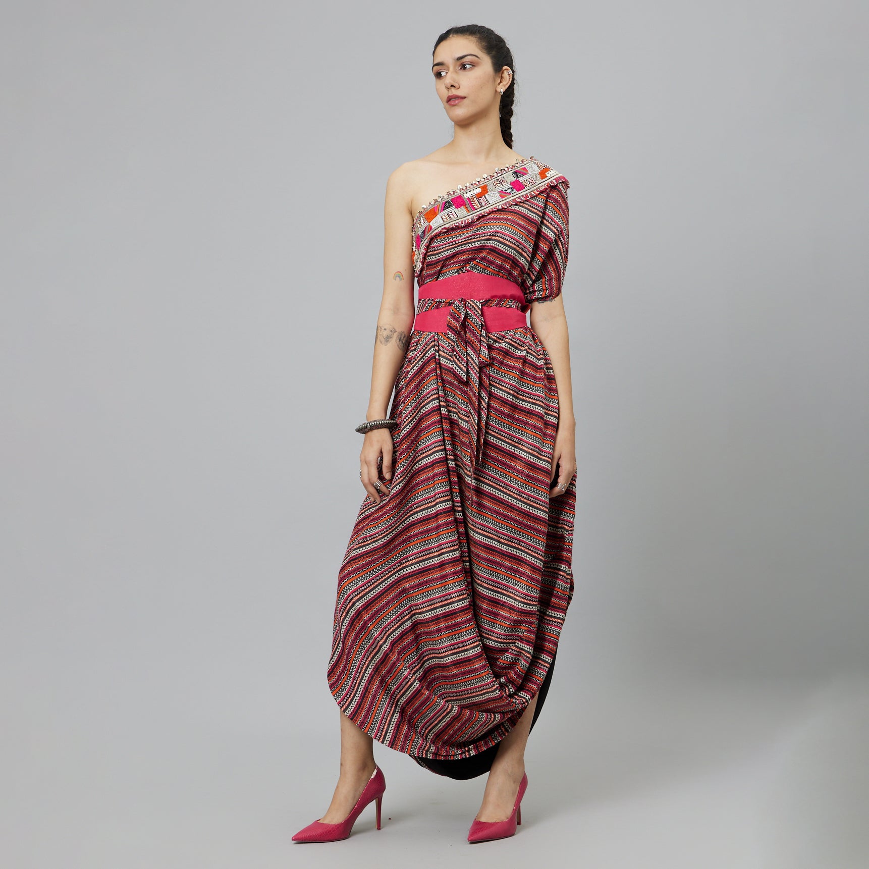 BOHEMIAN STRIPE ONE SHOULDER COWL DRESS TEAMED WITH A BELT