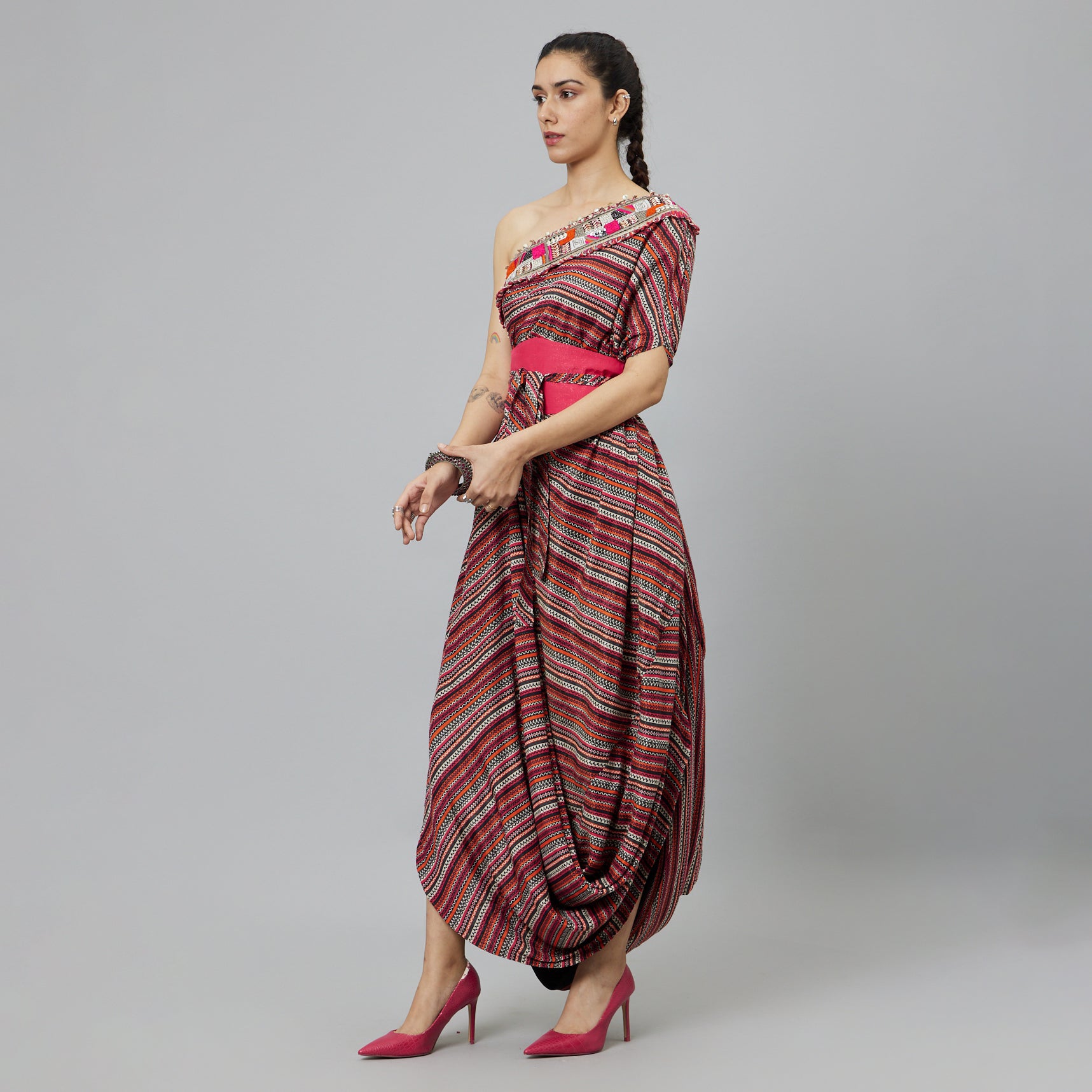 BOHEMIAN STRIPE ONE SHOULDER COWL DRESS TEAMED WITH A BELT