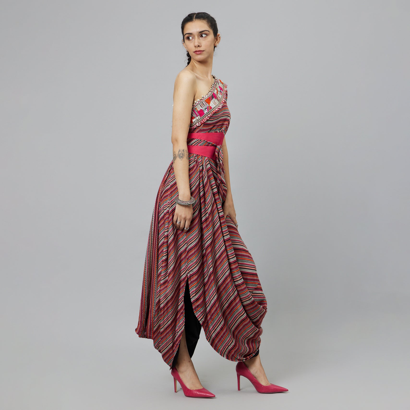 BOHEMIAN STRIPE ONE SHOULDER COWL DRESS TEAMED WITH A BELT