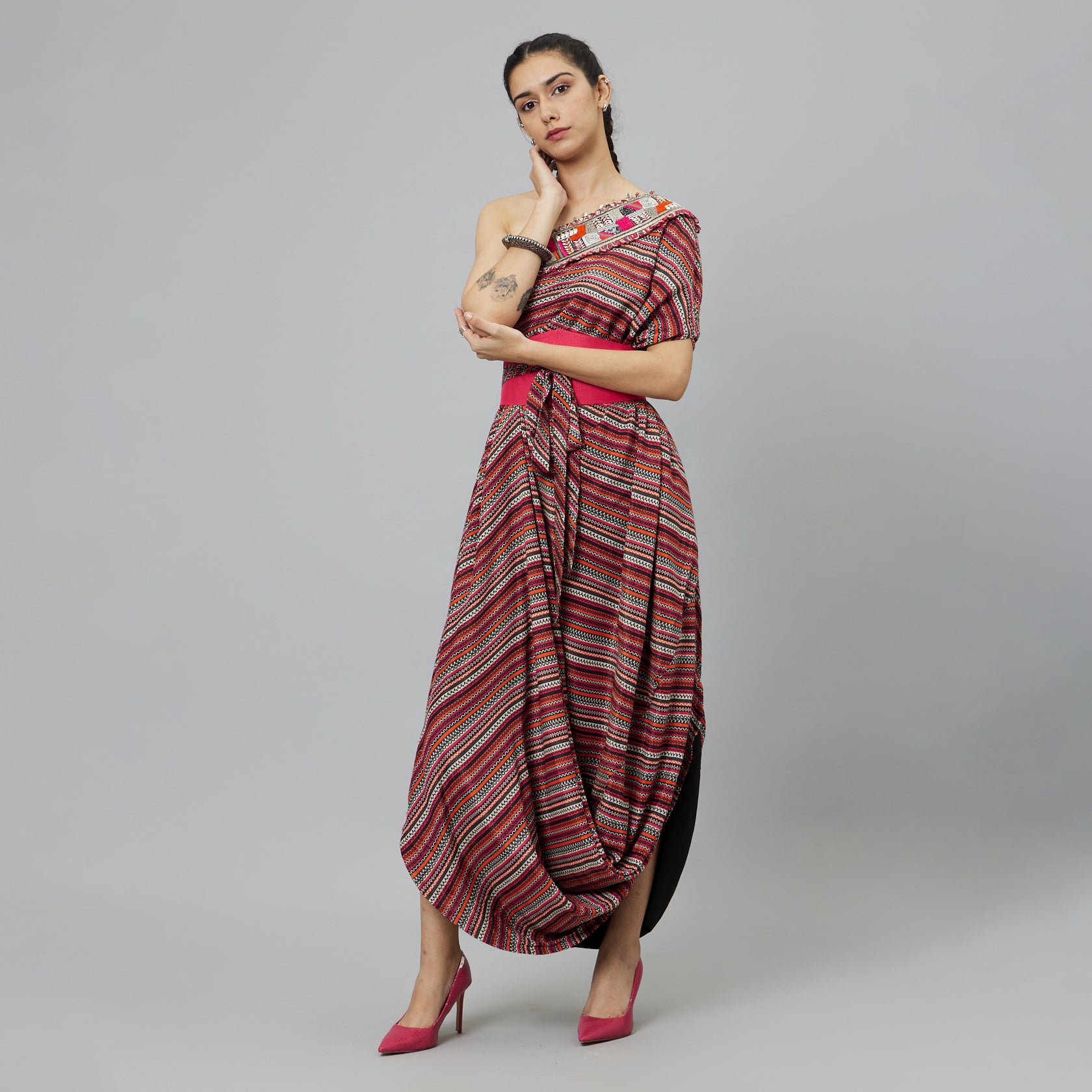 BOHEMIAN STRIPE ONE SHOULDER COWL DRESS TEAMED WITH A BELT