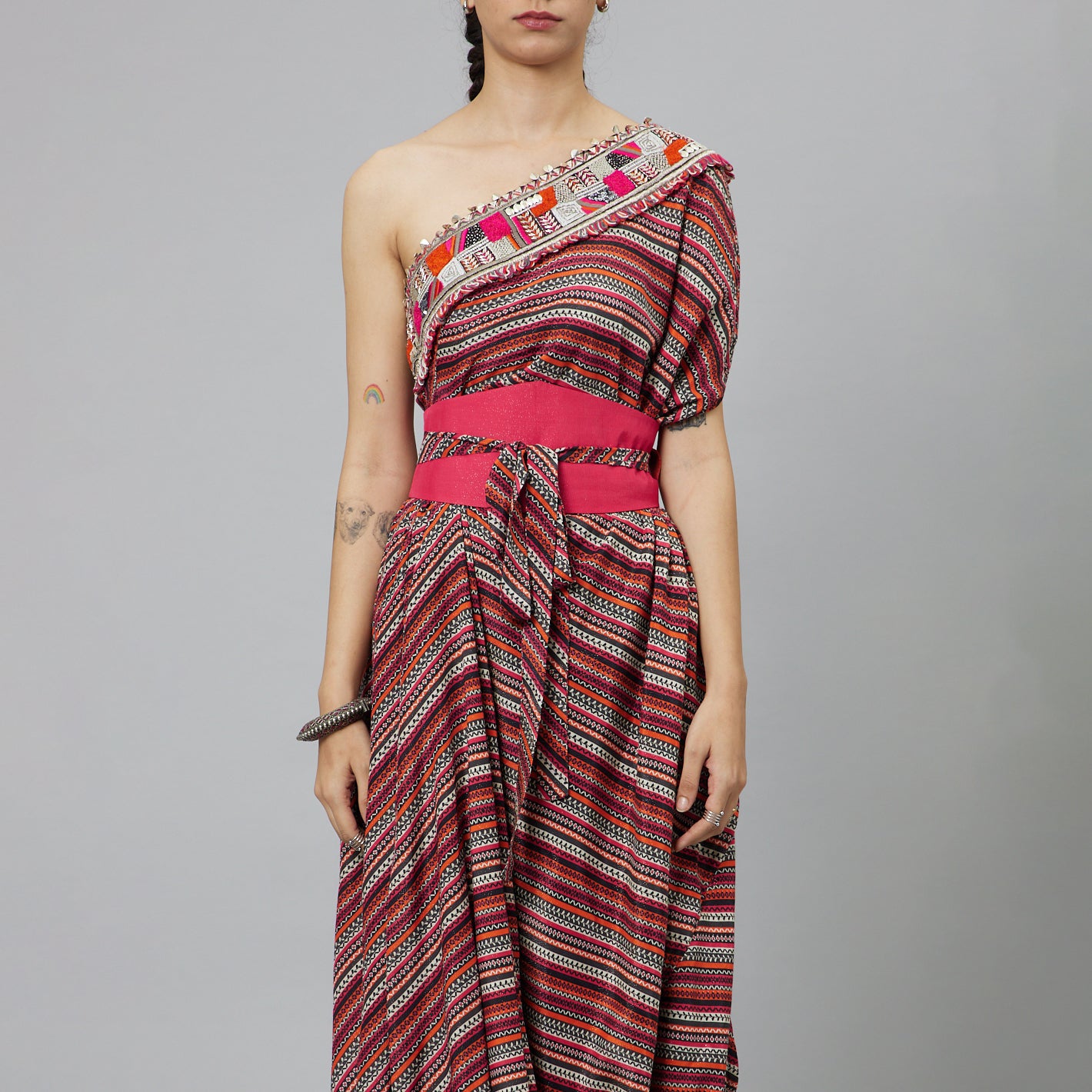 BOHEMIAN STRIPE ONE SHOULDER COWL DRESS TEAMED WITH A BELT