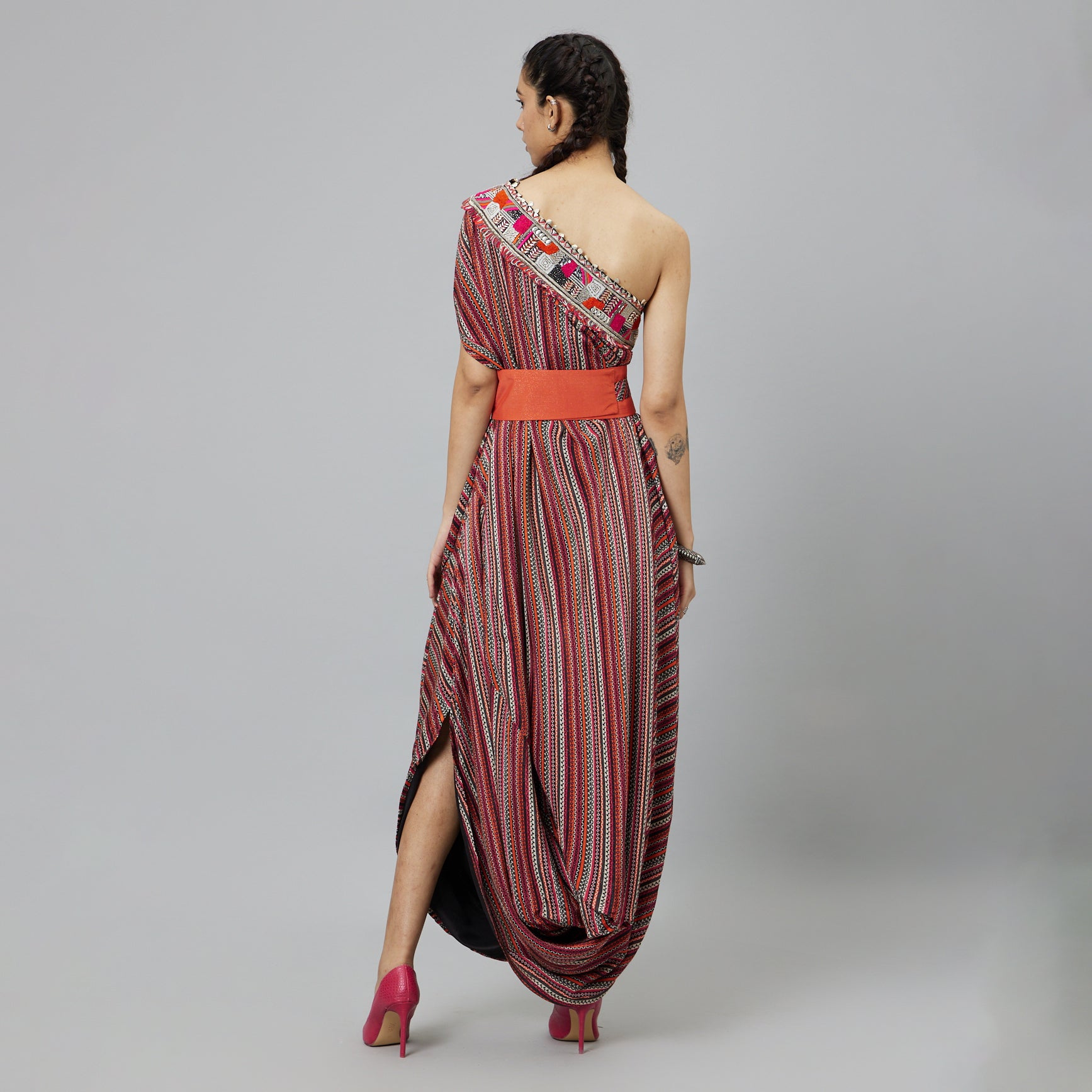 BOHEMIAN STRIPE ONE SHOULDER COWL DRESS TEAMED WITH A BELT