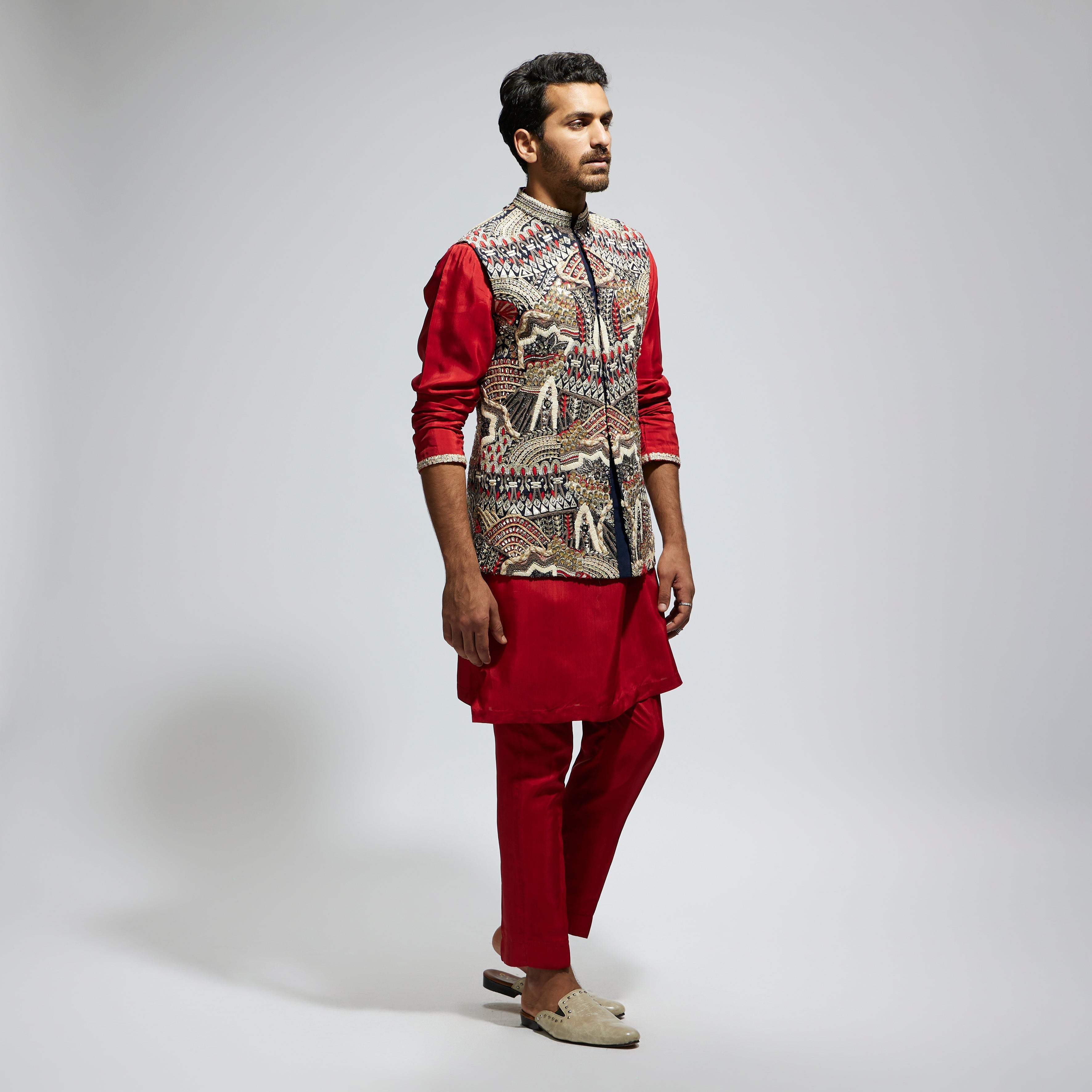 SAMSARA: BLUE ABTRACT EMBROIDERED BUNDI WITH ORANGE SOLID KURTA AND PANT