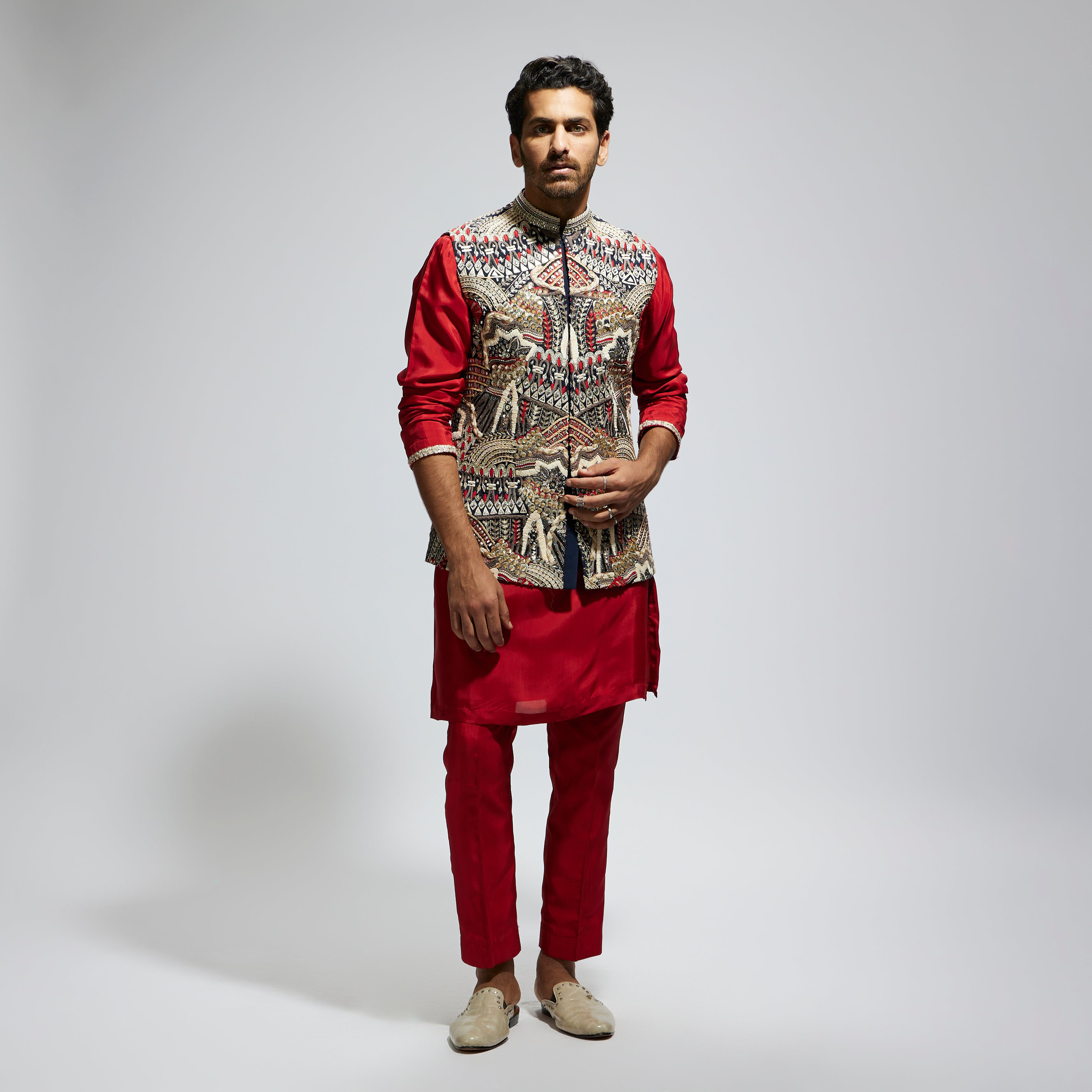 BLUE ABTRACT EMBROIDERED BUNDI WITH ORANGE SOLID KURTA AND PANTS