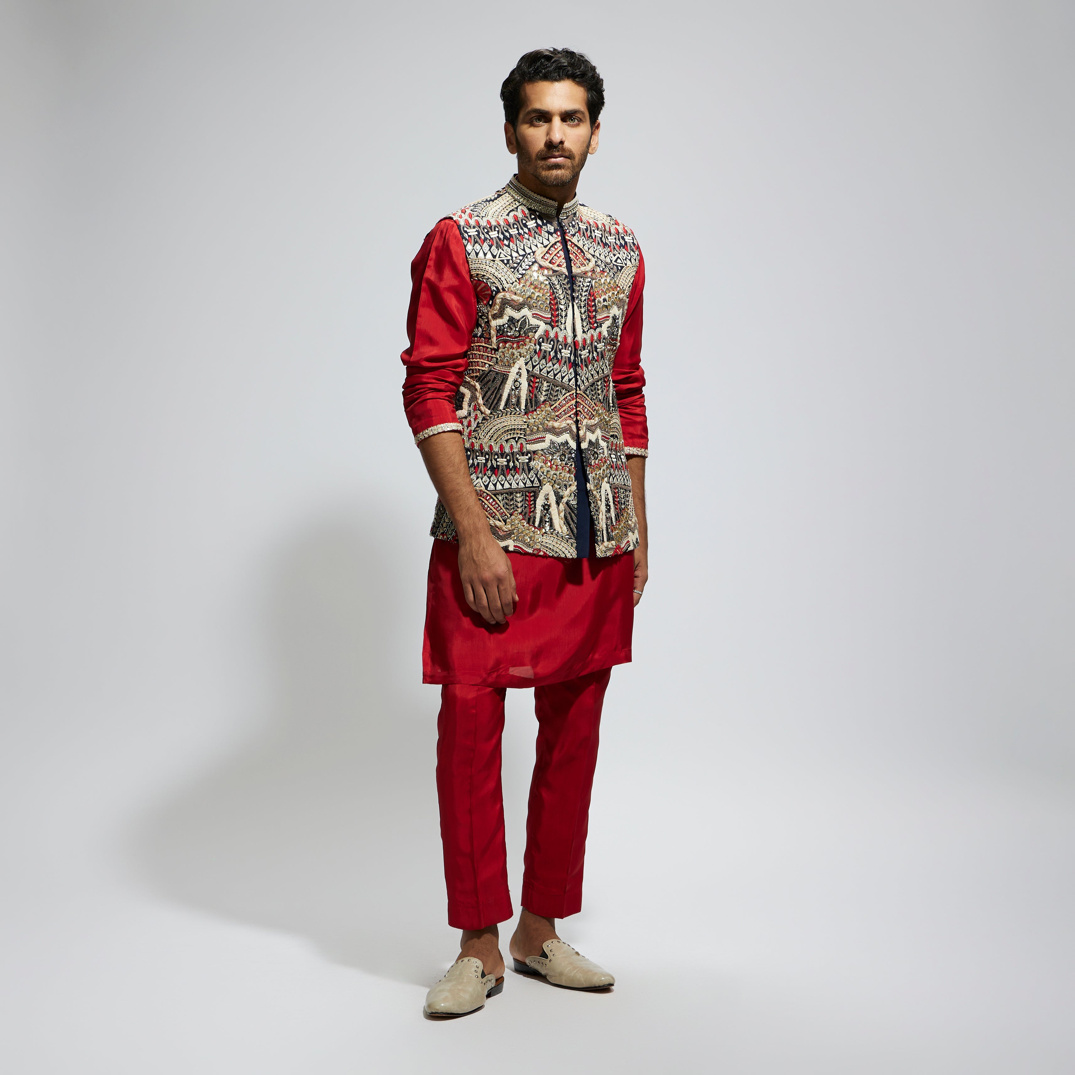 BLUE ABTRACT EMBROIDERED BUNDI WITH ORANGE SOLID KURTA AND PANTS