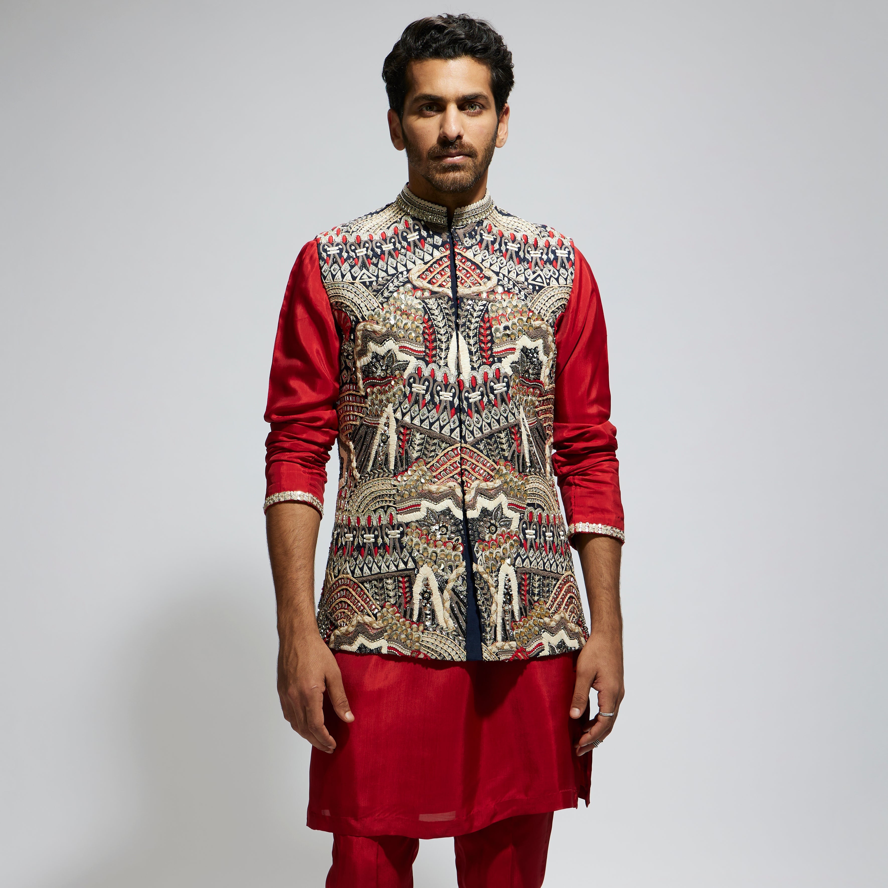 BLUE ABTRACT EMBROIDERED BUNDI WITH ORANGE SOLID KURTA AND PANTS