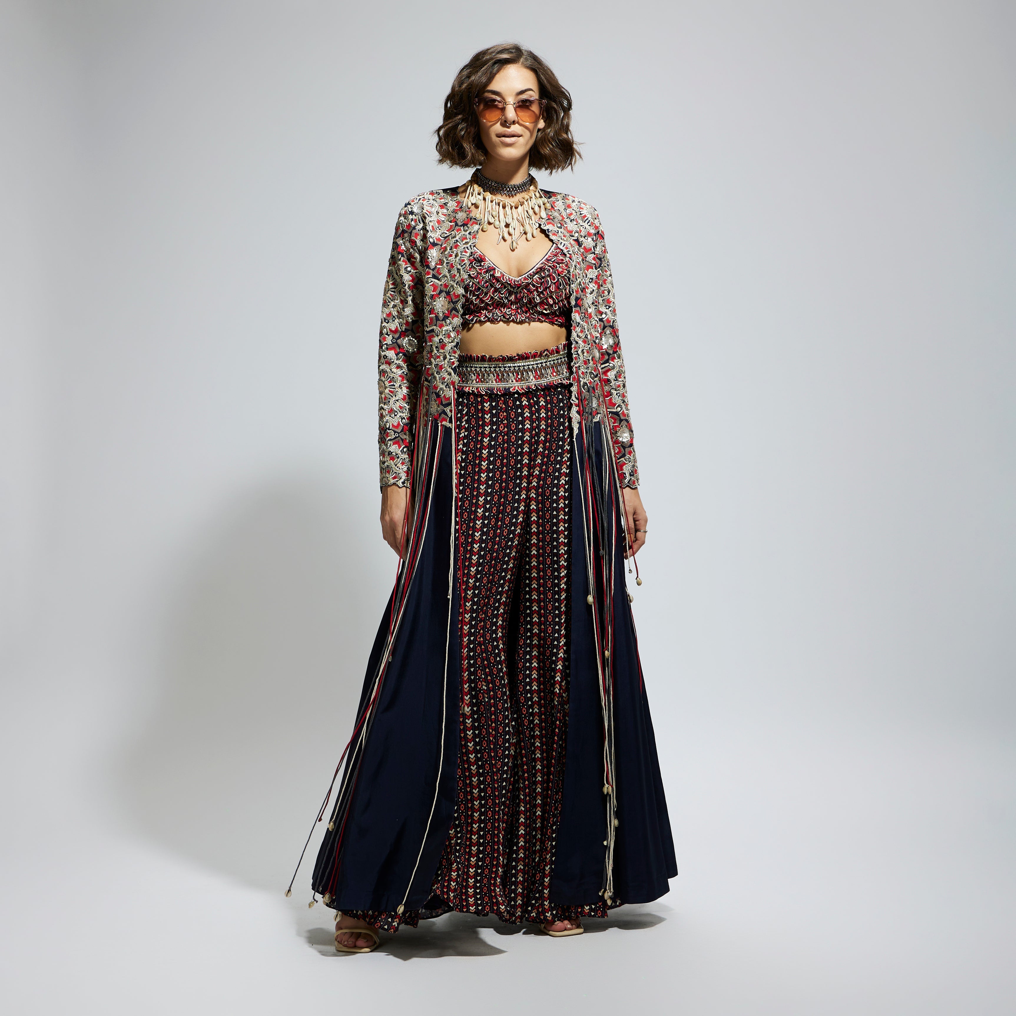 BLUE THREADWORK EMBELLISHED JACKET PAIRED WITH TEXTURED BUSTIER AND BLUE PRINTED SHARARA PANTS