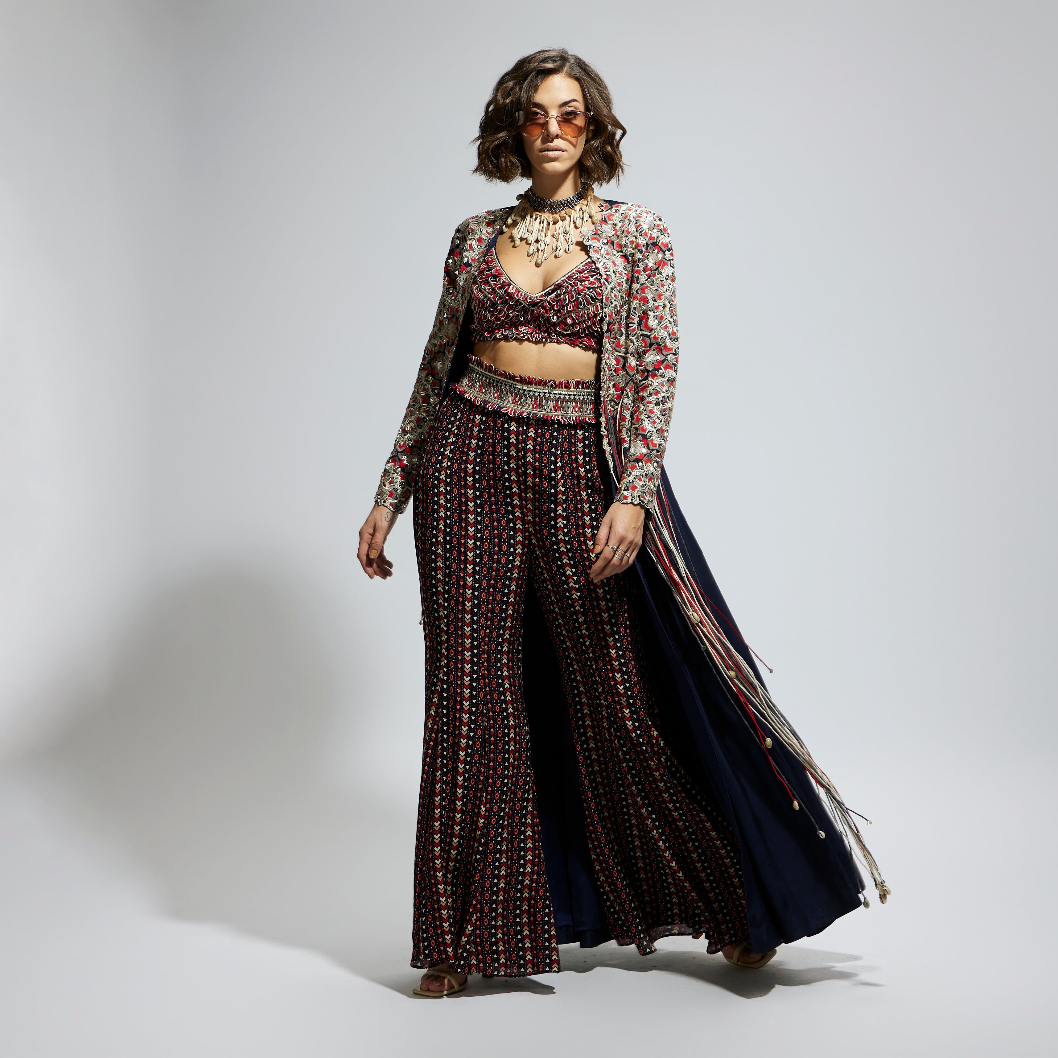 BLUE THREADWORK EMBELLISHED JACKET PAIRED WITH TEXTURED BUSTIER AND BLUE PRINTED SHARARA PANTS