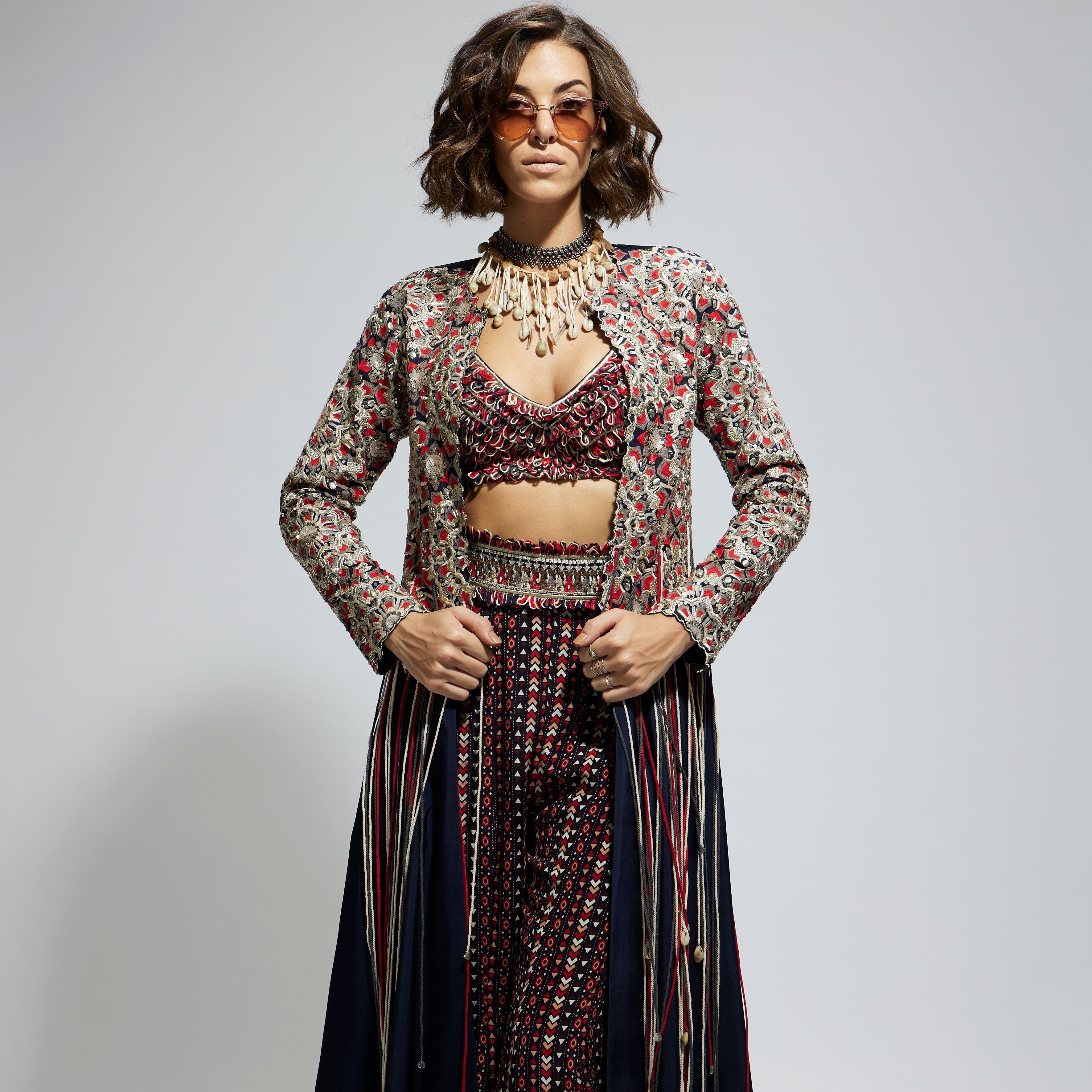 BLUE THREADWORK EMBELLISHED JACKET PAIRED WITH TEXTURED BUSTIER AND BLUE PRINTED SHARARA PANTS