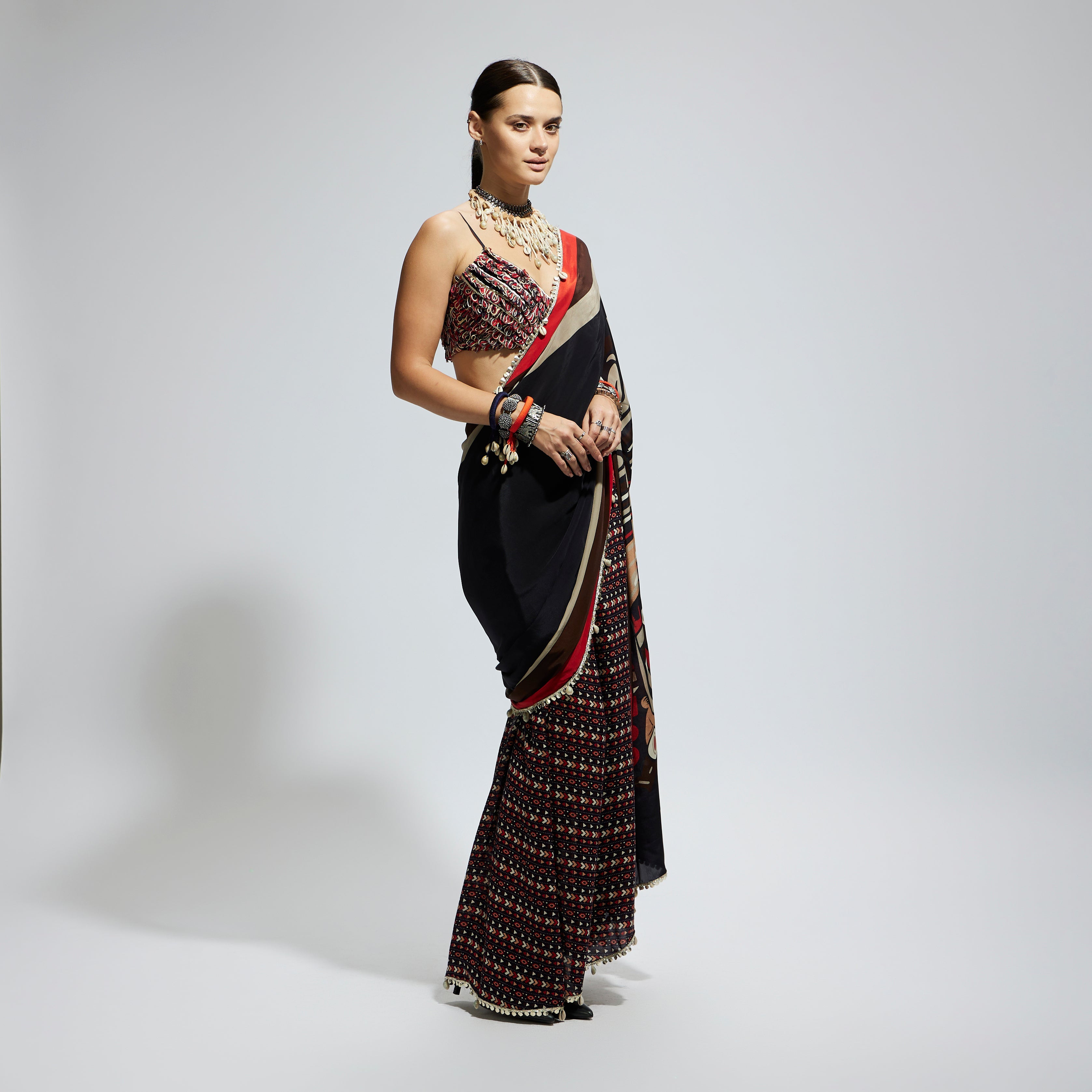 BLACK MASK PRINT CASCADE SAREE WITH METALLIC BUSTIER