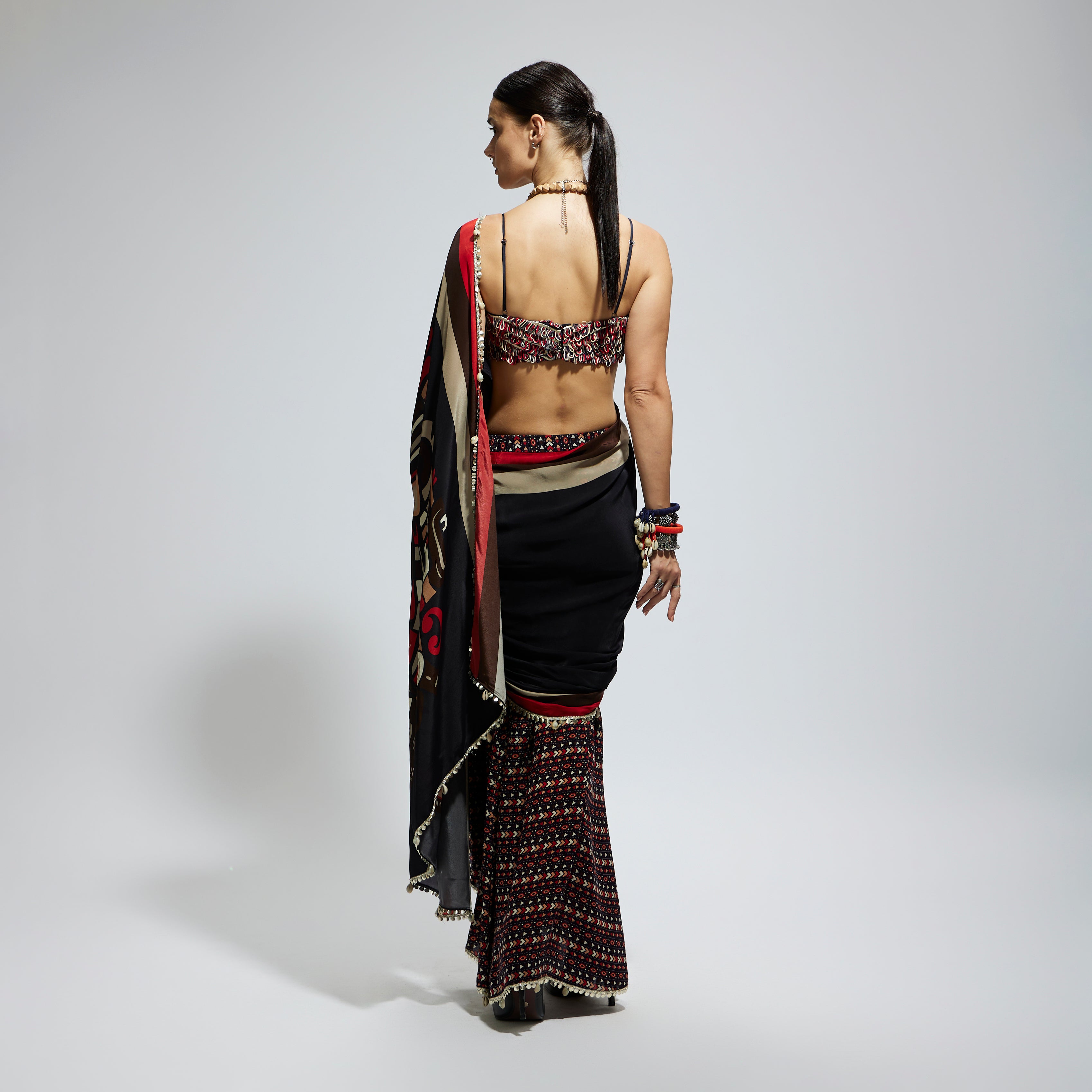 BLACK MASK PRINT CASCADE SAREE WITH METALLIC BUSTIER