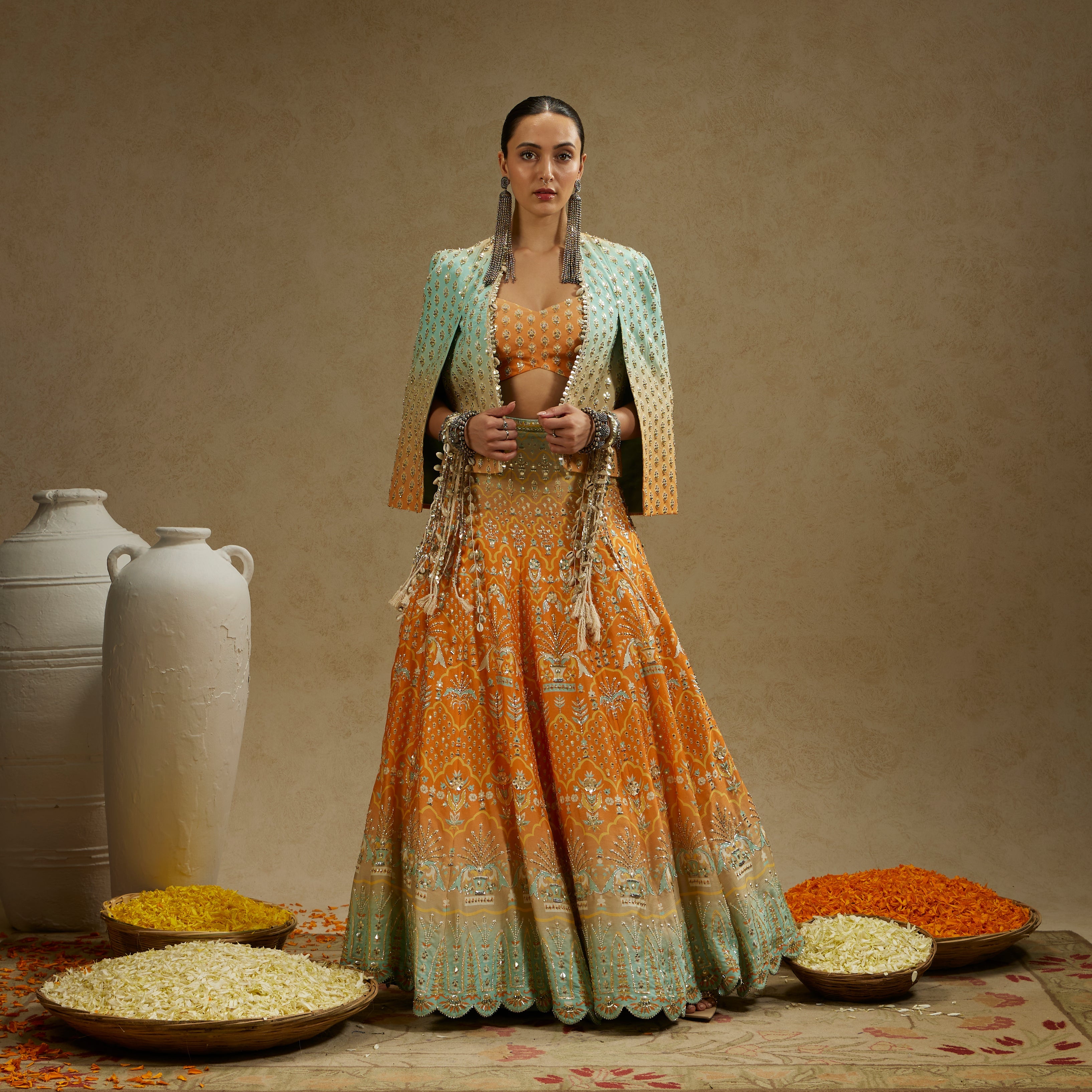 ORANGE BLUE EMBELLISHED NOOR JACKET PAIRED WITH EMBELLISHED BUSTIER AND OMBRE EMBELLISHED LEHENGA