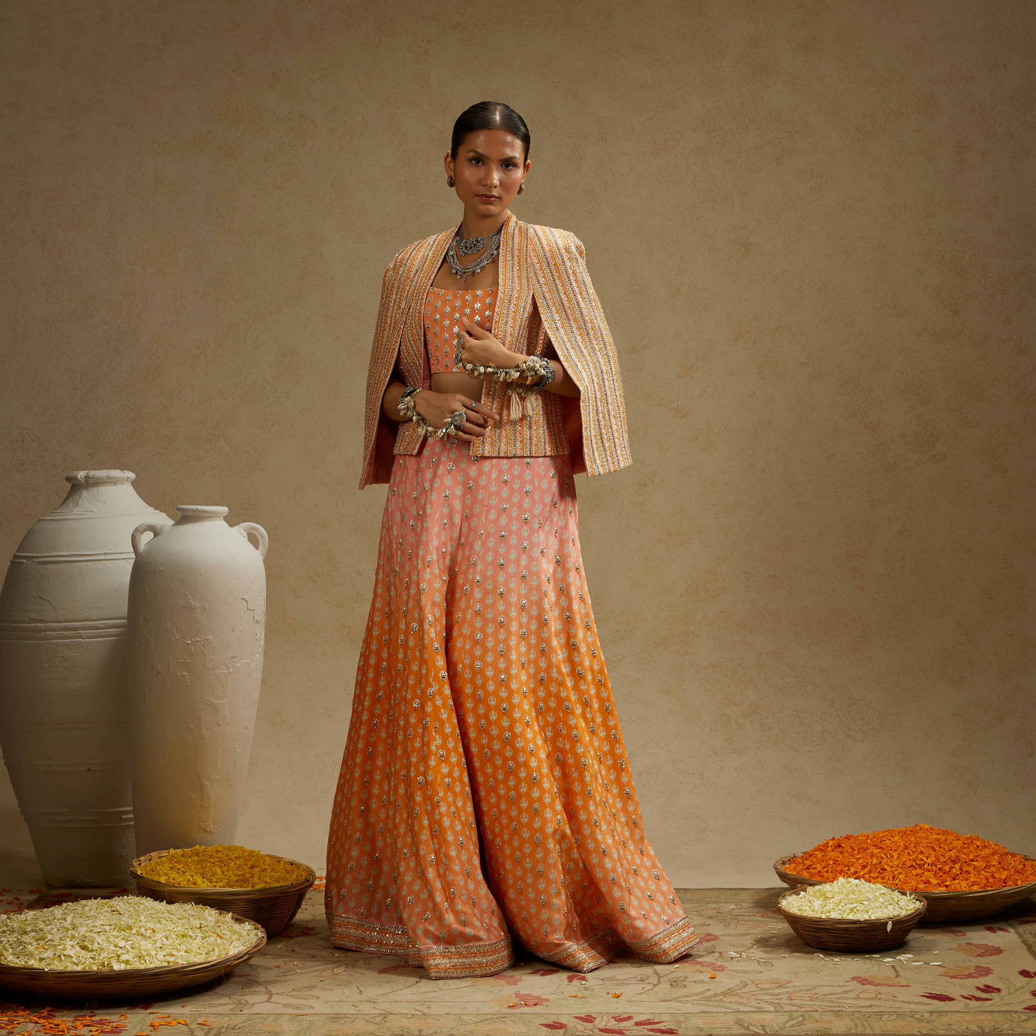 MEHEK: Border Embellished Noor Jacket Paired With Embellished Bustier And Ombre Embellished Lehenga