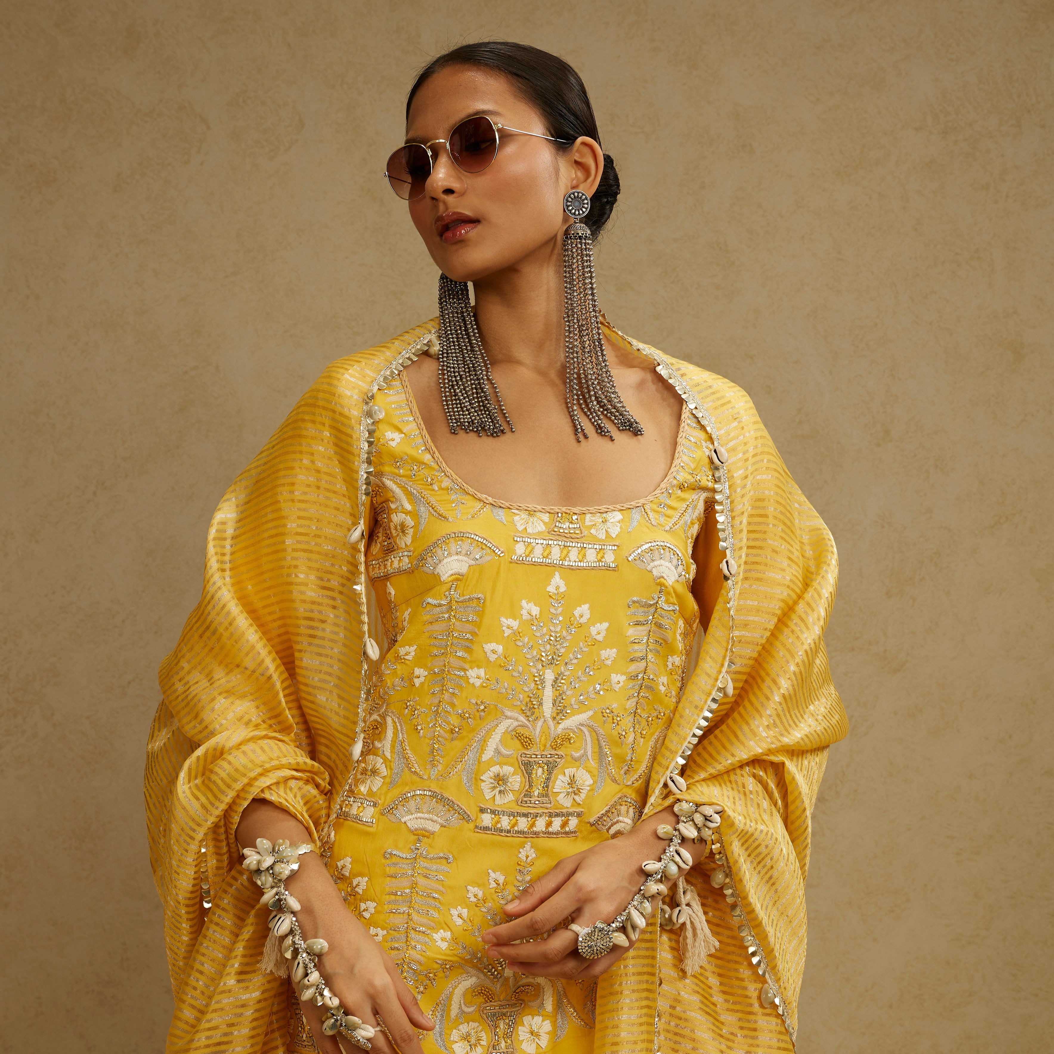 YELLOW EMBELLISHED KURTA PAIRED WITH SHARARA AND STRIPE DUPATTA