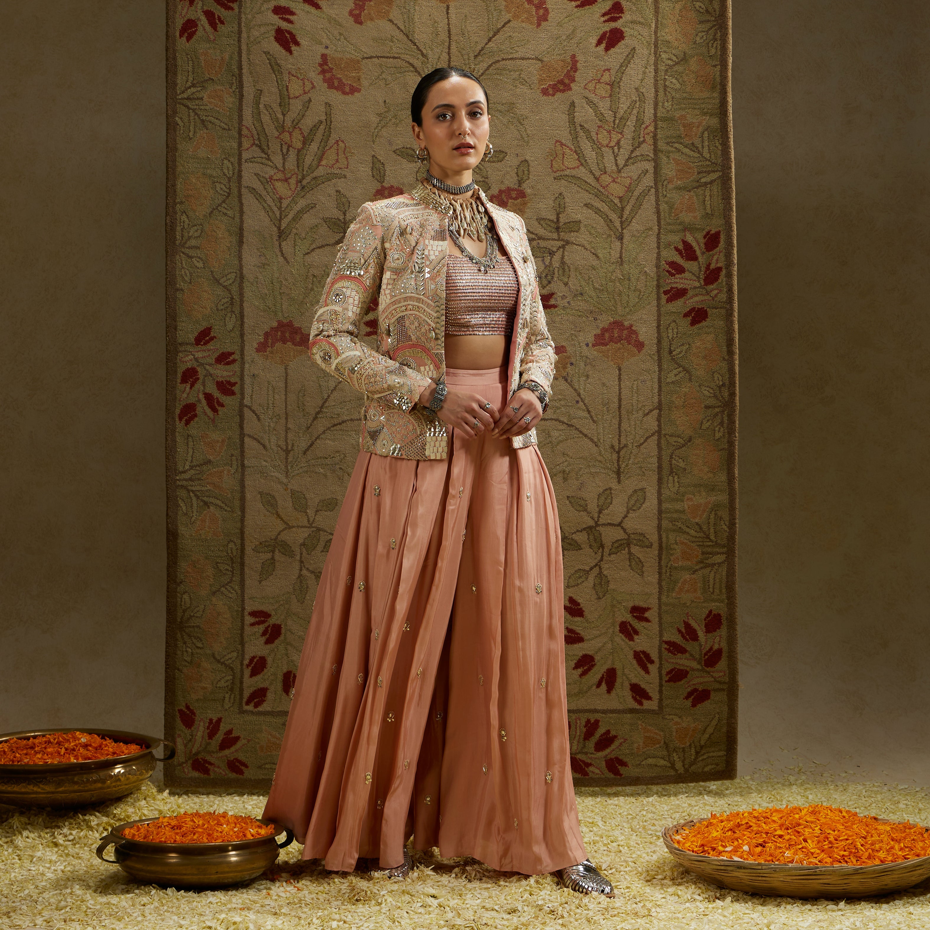 PINK EMBELLSIHED JACKET PAIRED WITH BUSTIER AND EMBELLISHED PLEATED PANTS