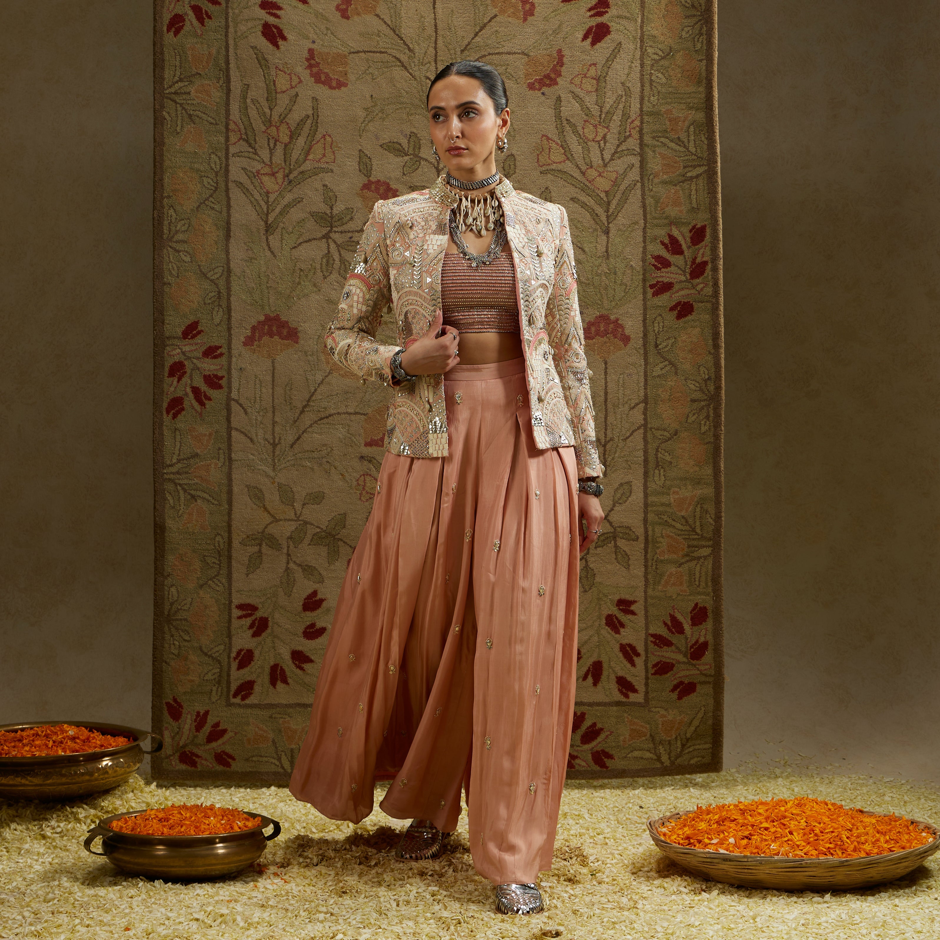 PINK EMBELLSIHED JACKET PAIRED WITH BUSTIER AND EMBELLISHED PLEATED PANTS