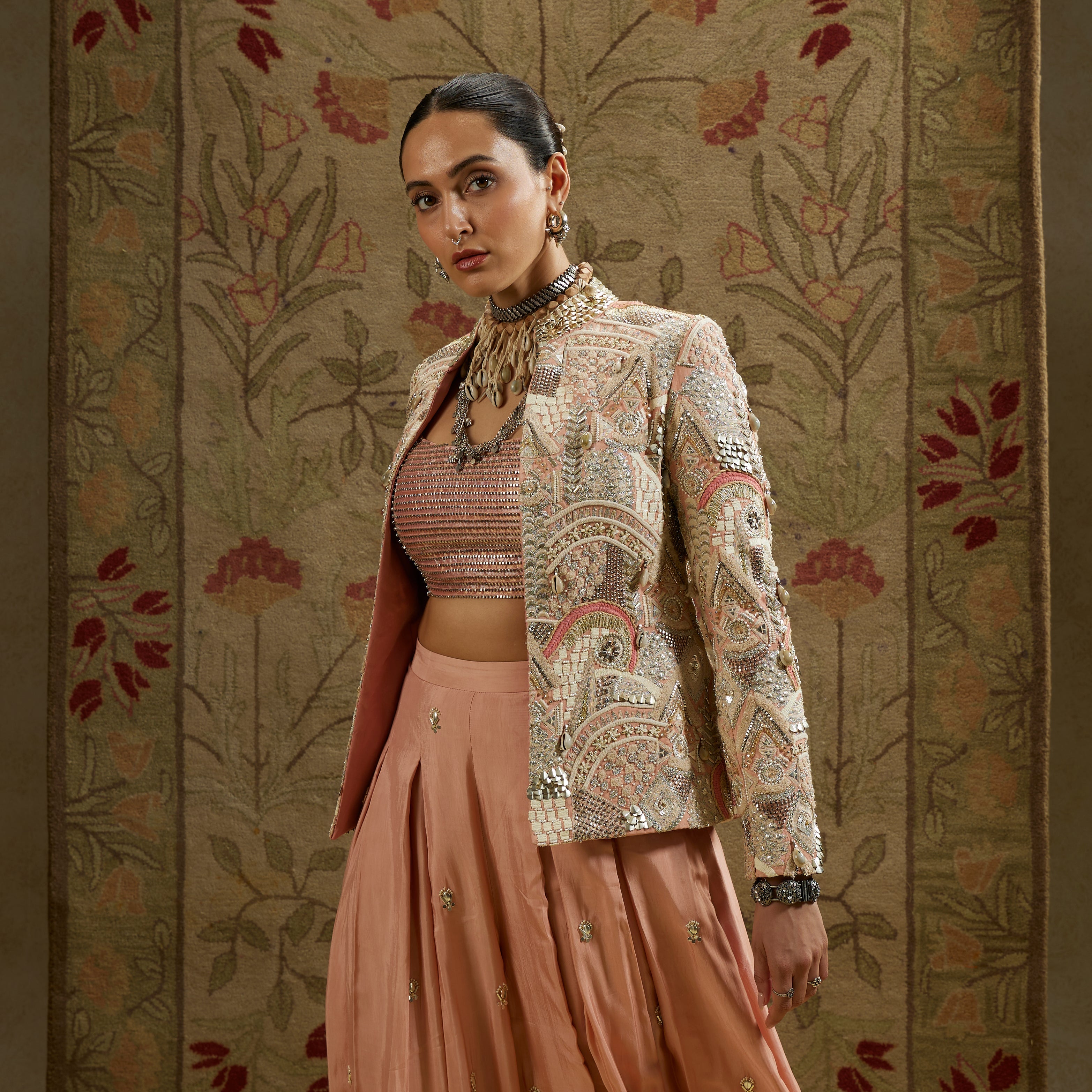 PINK EMBELLSIHED JACKET PAIRED WITH BUSTIER AND EMBELLISHED PLEATED PANTS