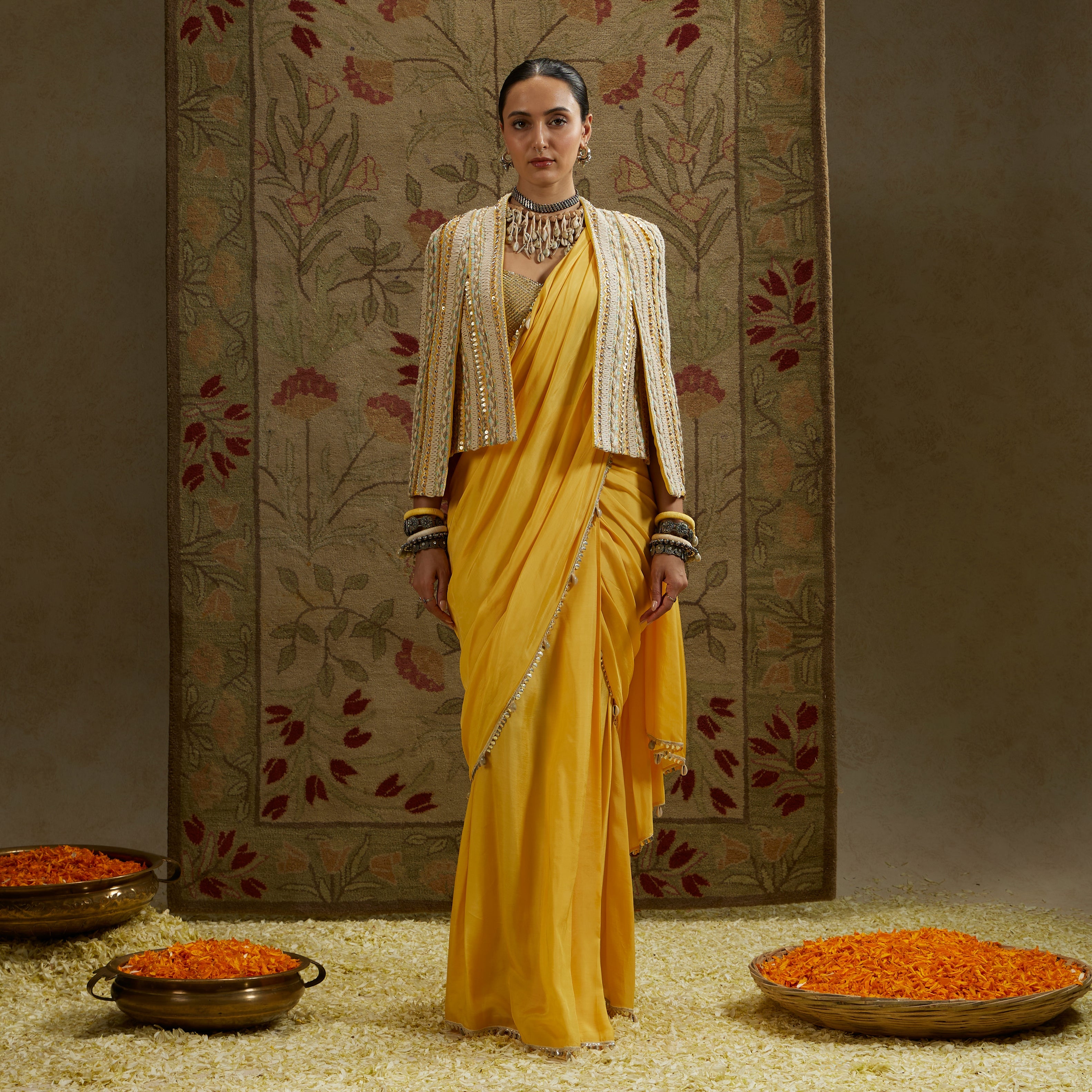 Dandelion Pre-Draped Saree Paired With Metal Embellished Bustier And Embellished Cape Jacket