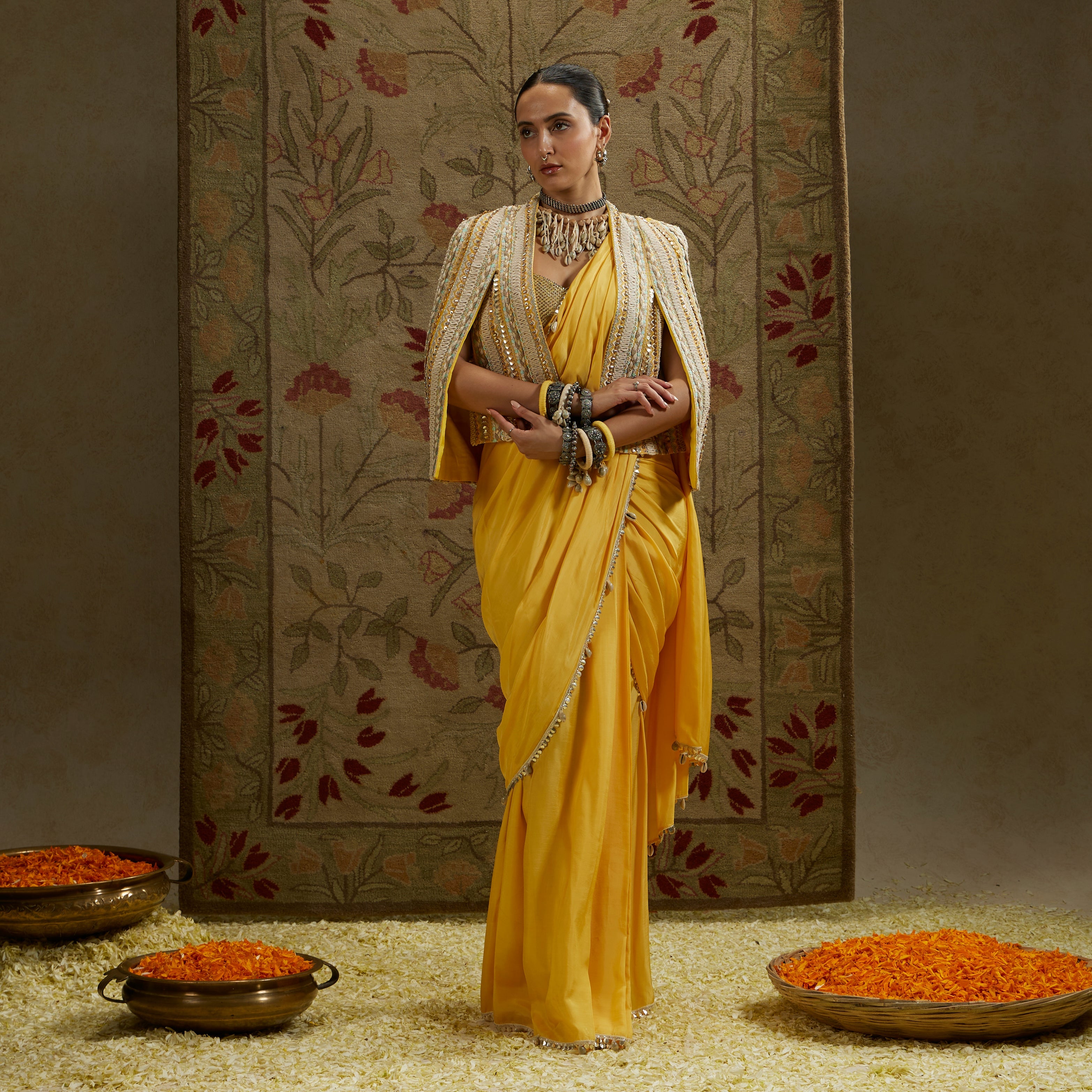 Dandelion Pre-Draped Saree Paired With Metal Embellished Bustier And Embellished Cape Jacket