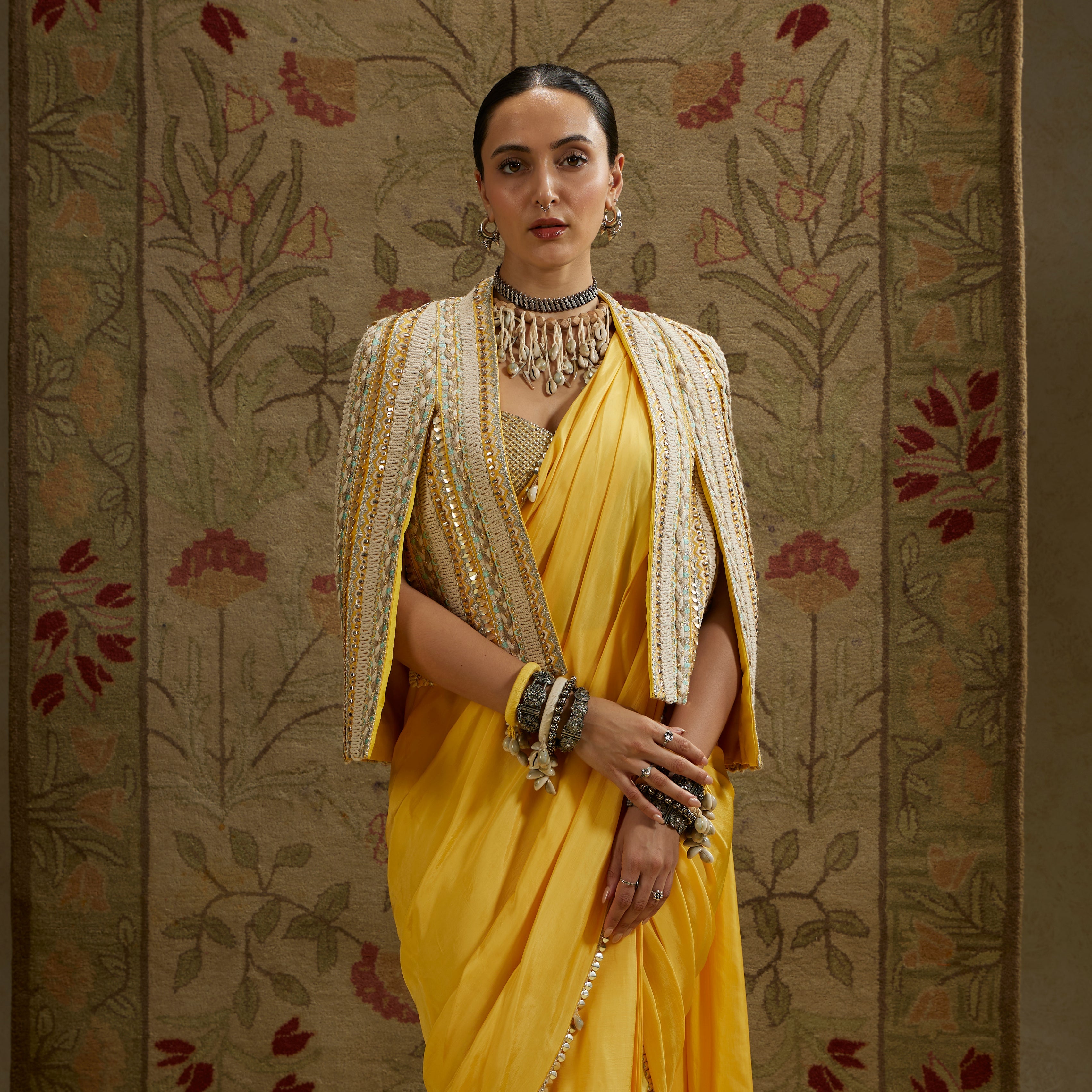 Dandelion Pre-Draped Saree Paired With Metal Embellished Bustier And Embellished Cape Jacket