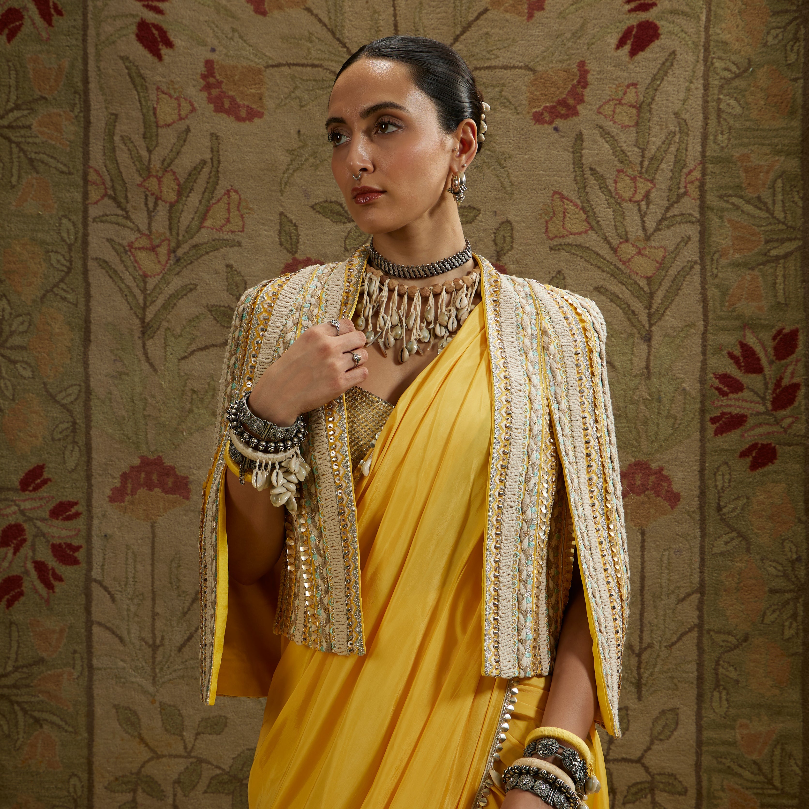 Dandelion Pre-Draped Saree Paired With Metal Embellished Bustier And Embellished Cape Jacket