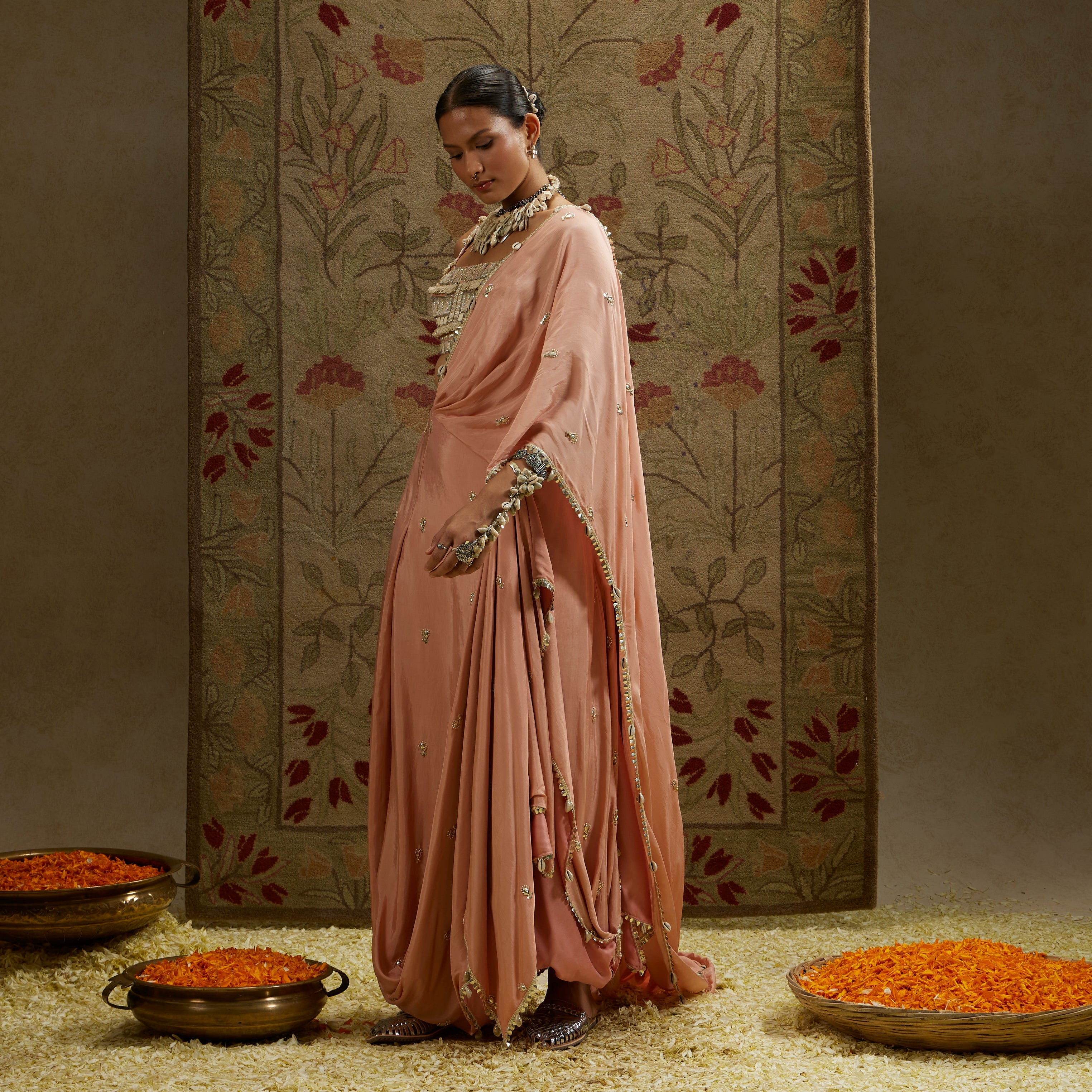 PINK EMBELLISHED SAREE PAIRED WITH EMBELLISHED BUSTIER AND DRAPED SKIRT