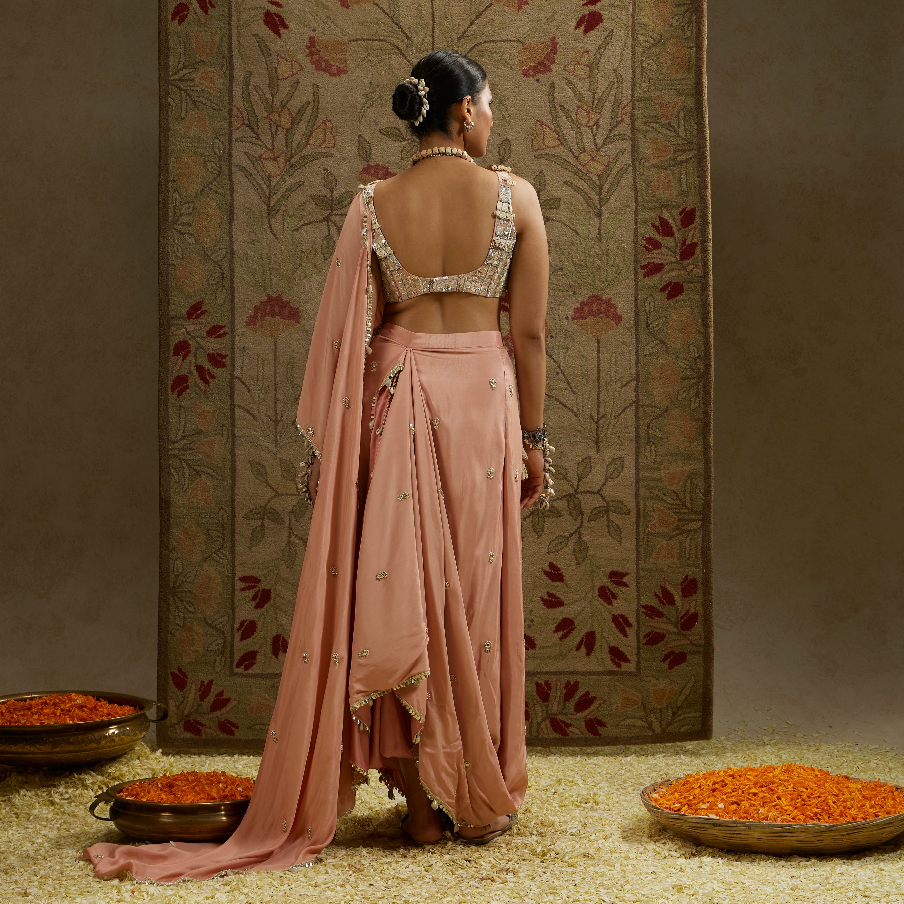 PINK EMBELLISHED SAREE PAIRED WITH EMBELLISHED BUSTIER AND DRAPED SKIRT