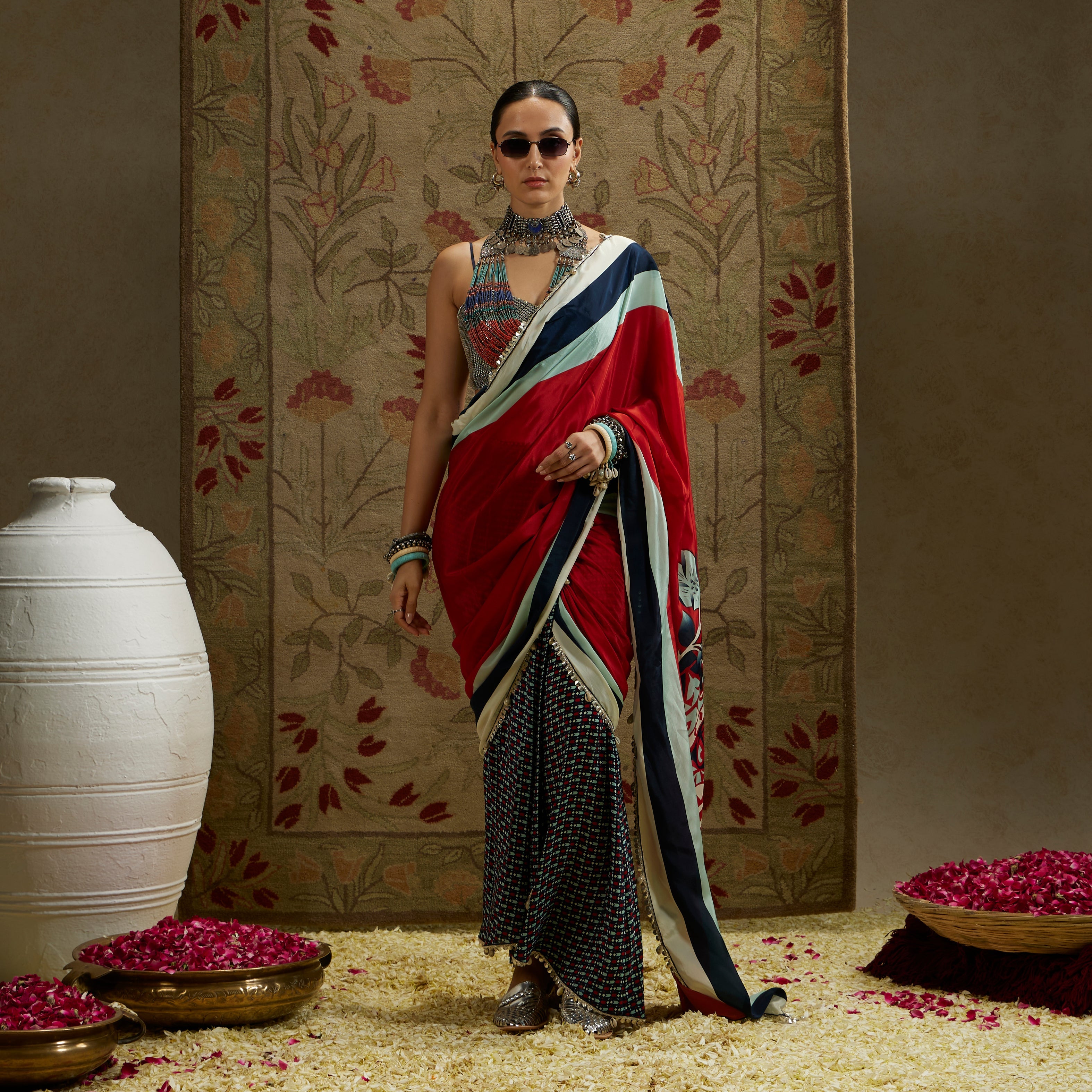 RED MASK PRINT CASCADE SAREE WITH METAL EMBELLISHED BUSTIER