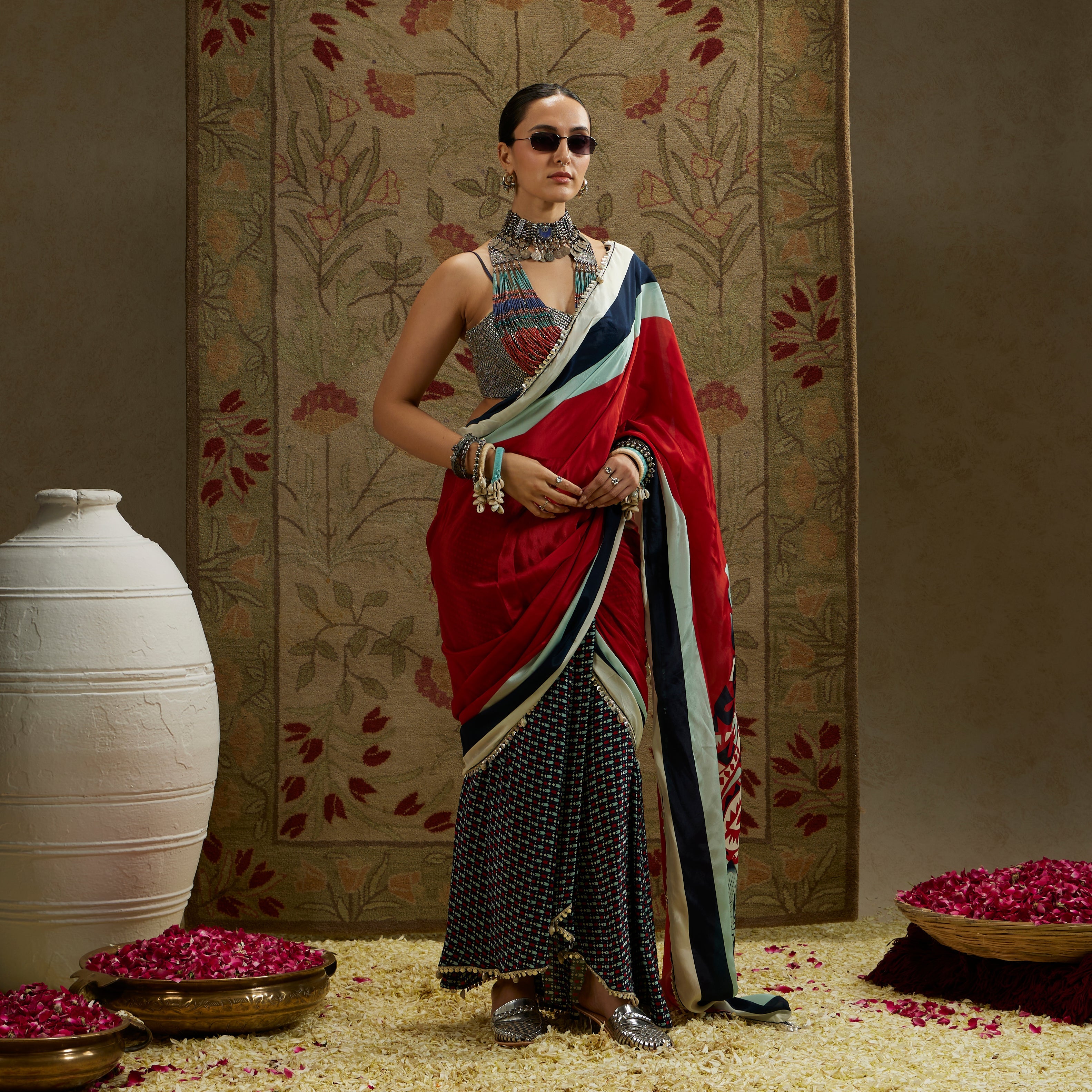 RED MASK PRINT CASCADE SAREE WITH METAL EMBELLISHED BUSTIER