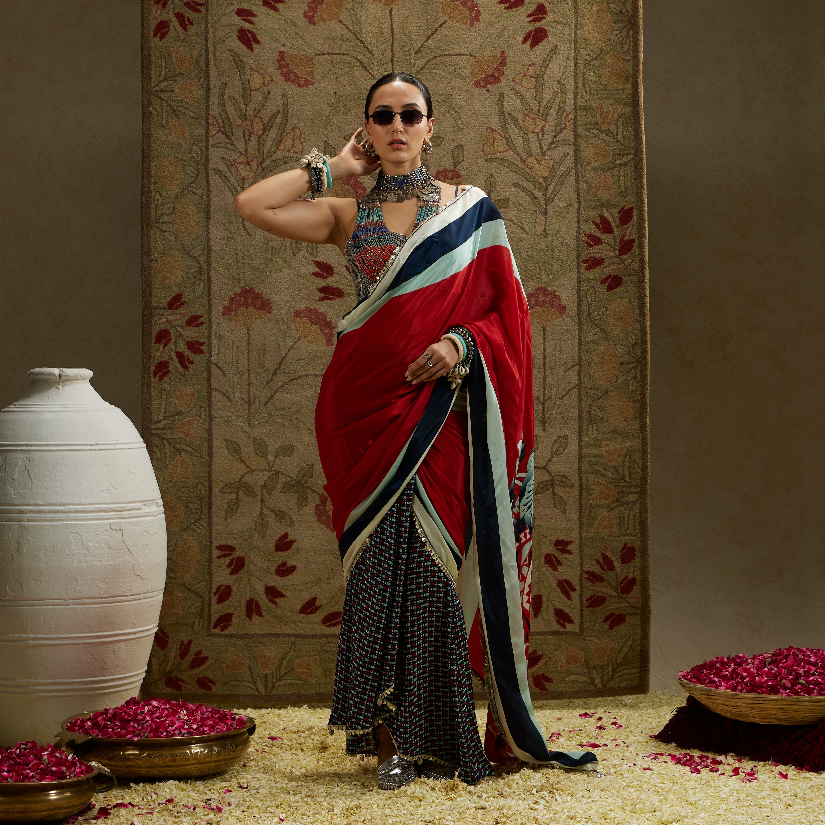 RED MASK PRINT CASCADE SAREE WITH METAL EMBELLISHED BUSTIER