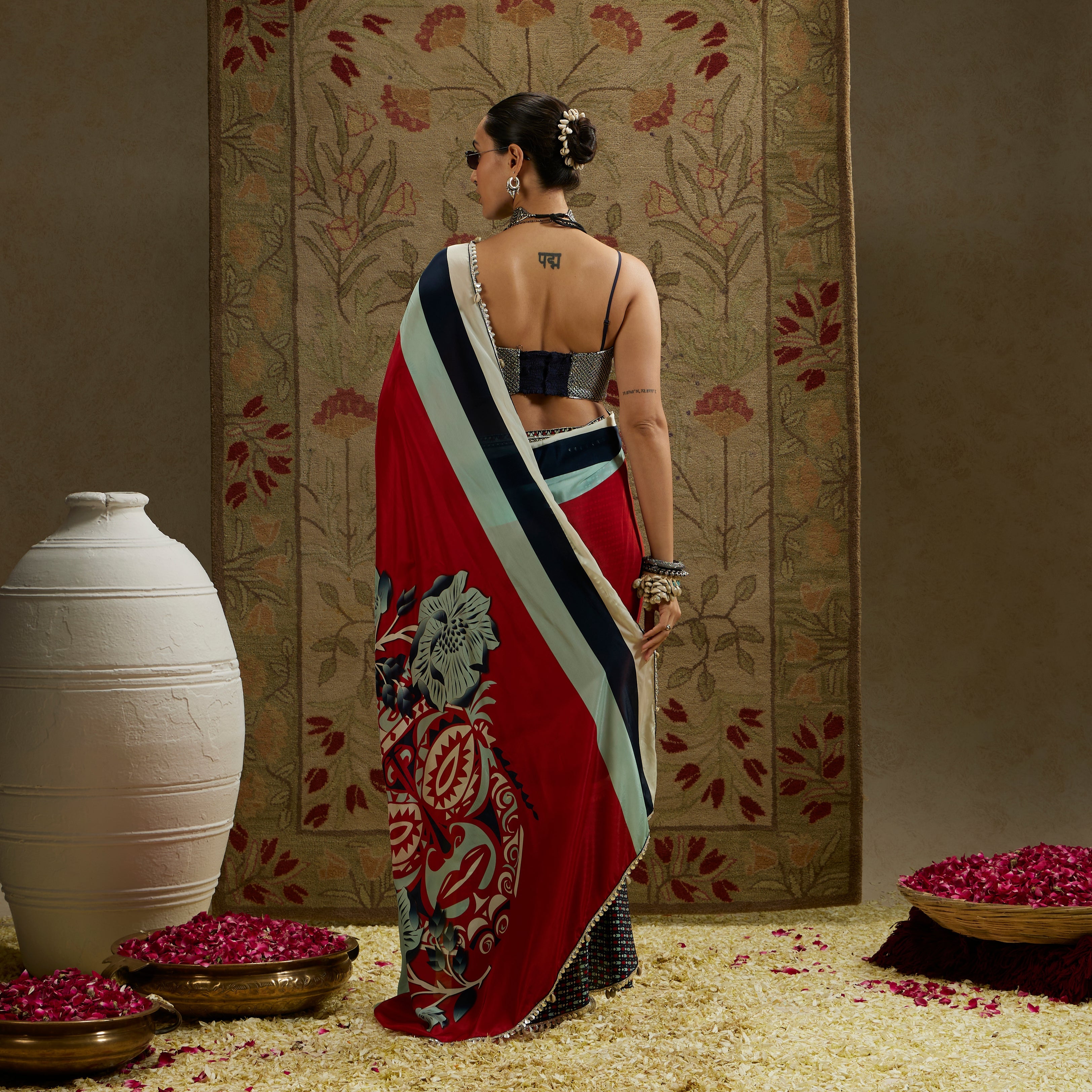 RED MASK PRINT CASCADE SAREE WITH METAL EMBELLISHED BUSTIER