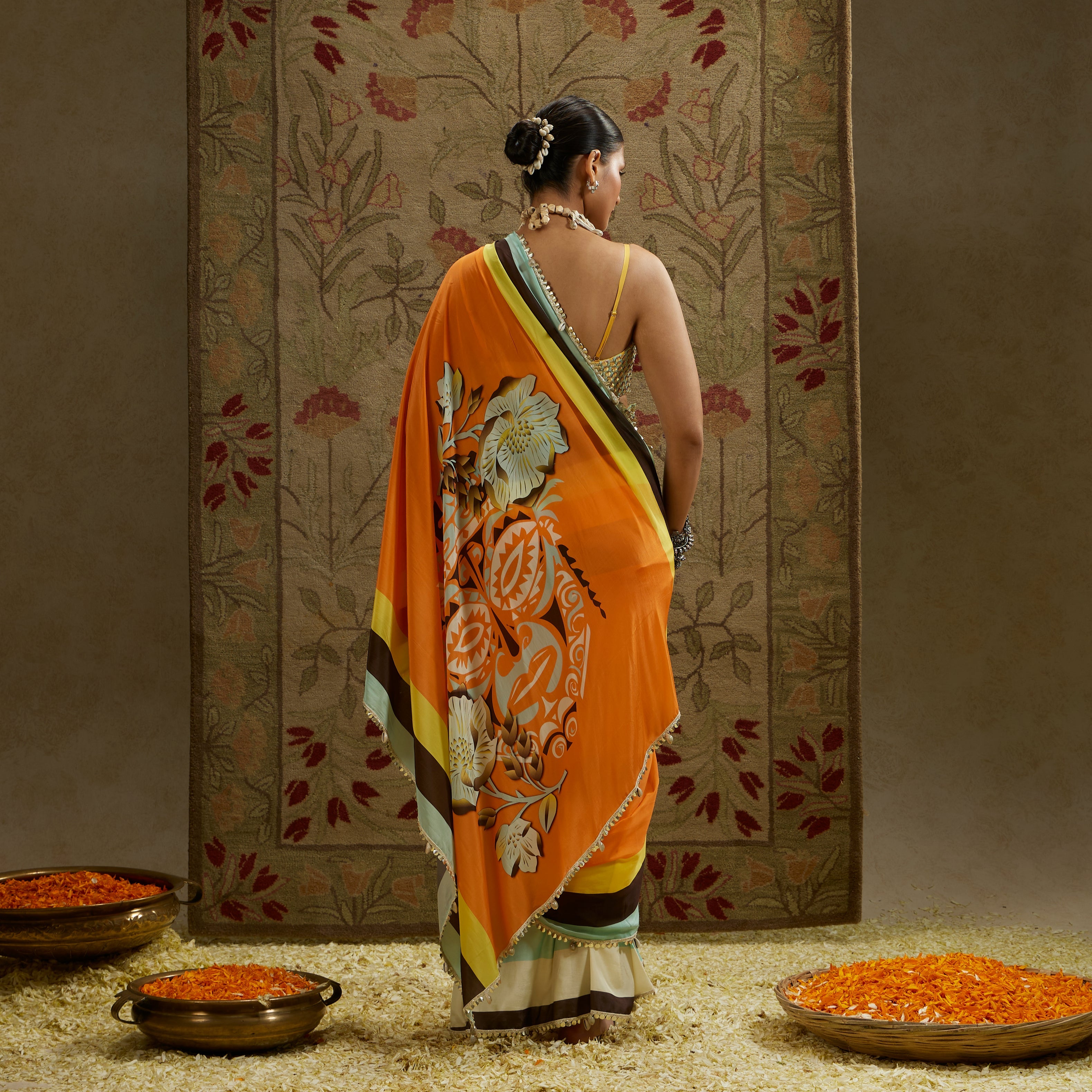 ORANGE MASK PRINT STRIPE PLEATED SAREE WITH METALLIC SCALLOP BUSTIER