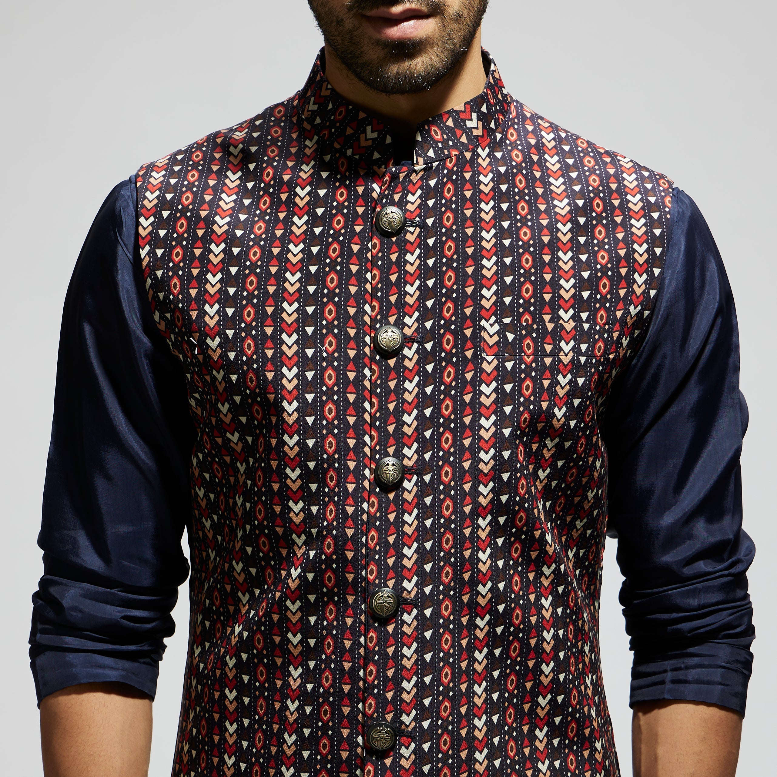 "BLUE BOHO GEO BUNDI
 PAIRED WITH SOLID BLUE KURTA AND PANTS"