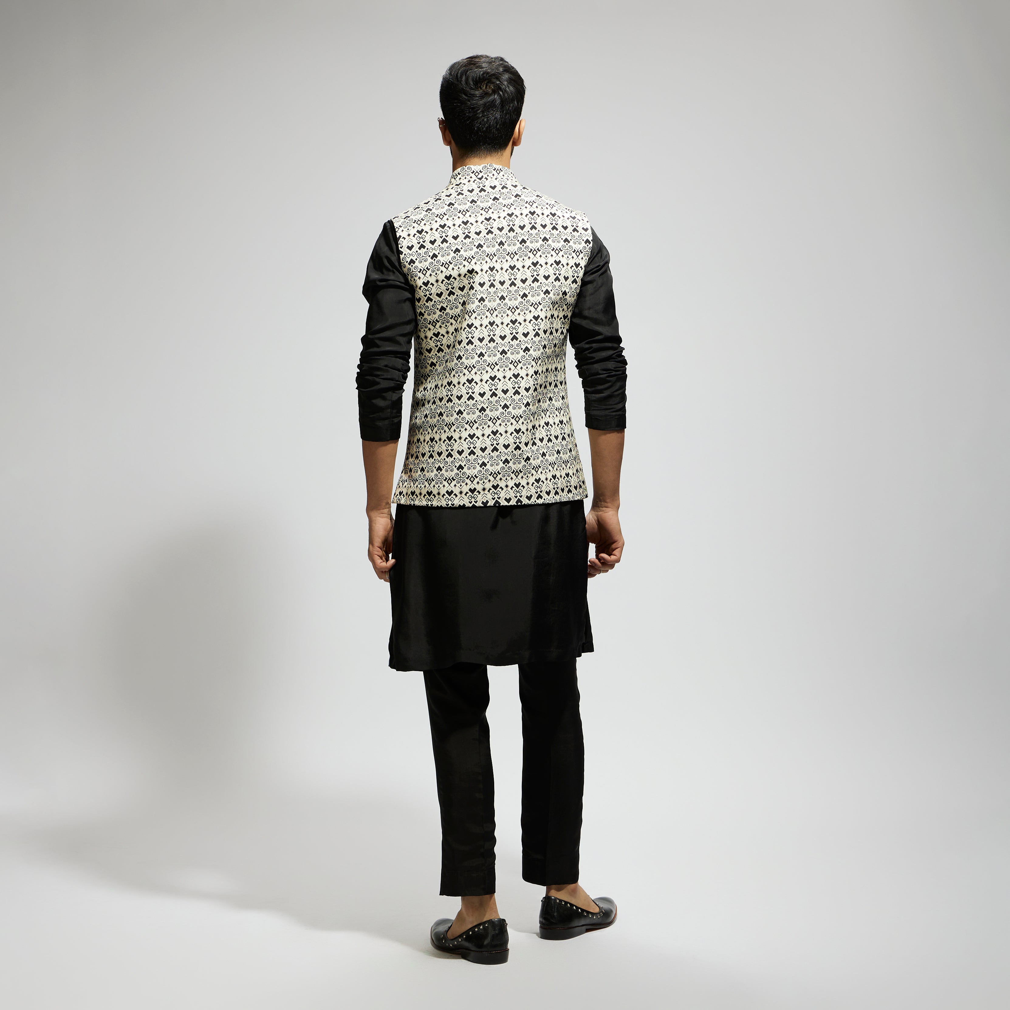 WHITE GEO PRINTED REVERSIBLE BUNDI AND BLACK KURTA AND PANTS