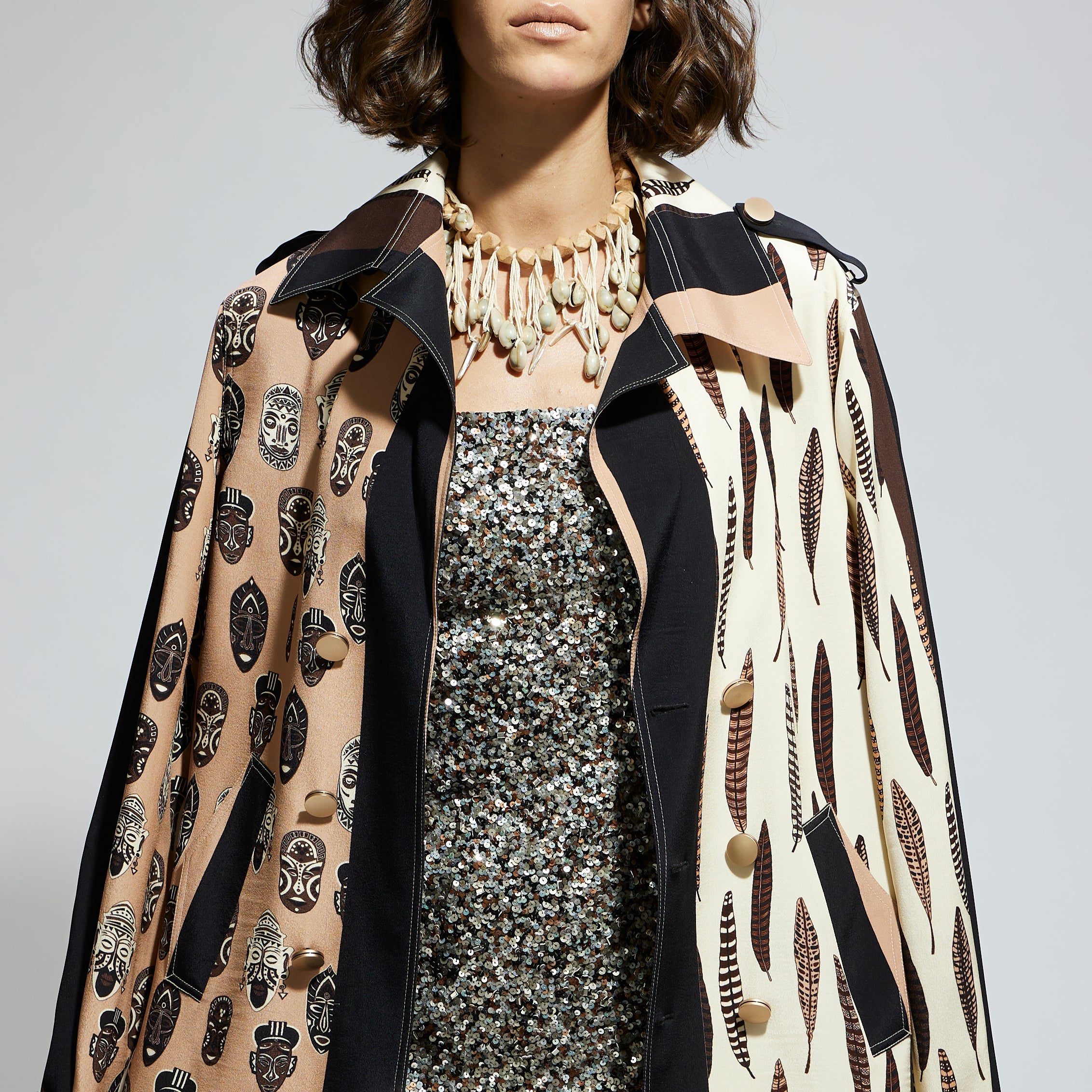 MASK AND FEATHER PRINT TRENCH COAT