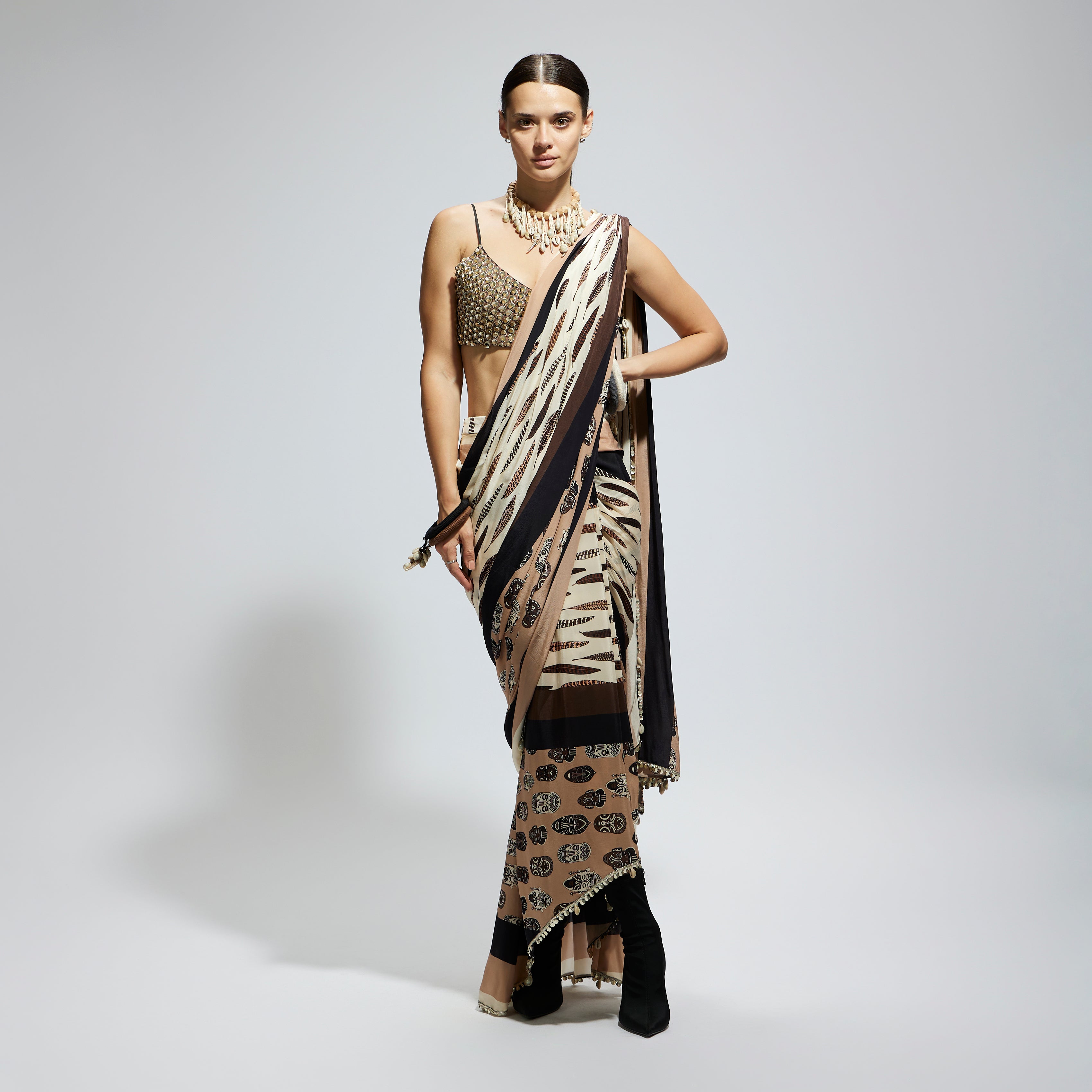 MASK AND FEATHER PRINT CASCADE SAREE PAIRED WITH METALLIC SCALLOP BUSTIER