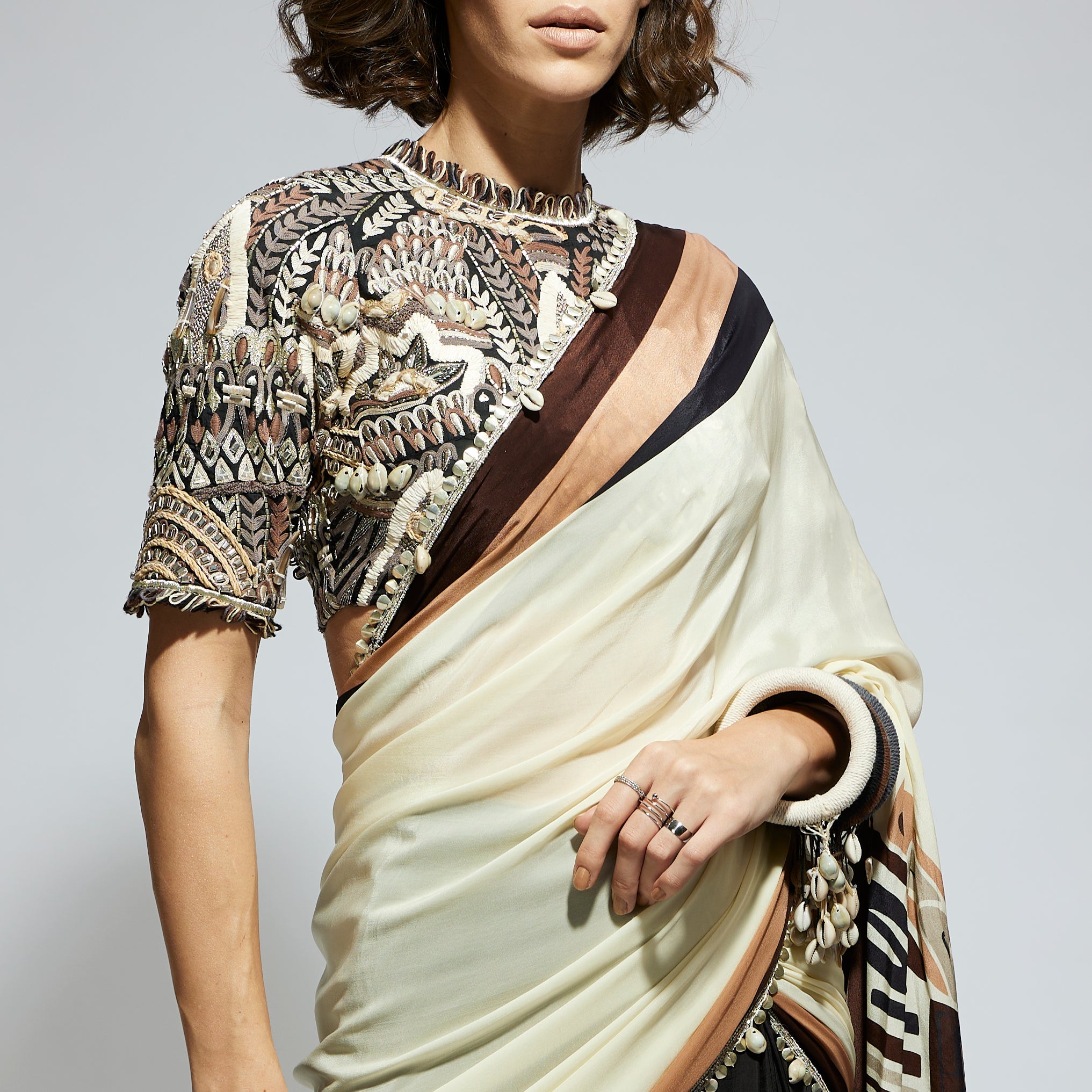 COLOR BLOCK MASK PRINT CASCADE SARI PAIRED WITH BLACK ABSTRACT EMBELLISHED BLOUSE