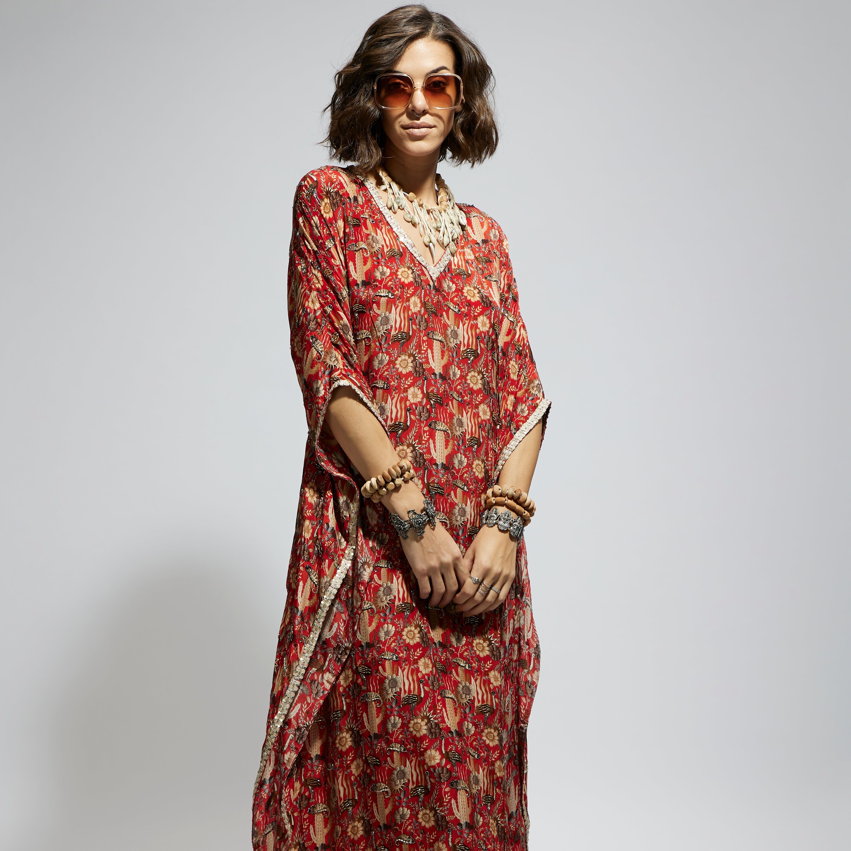 ORANGE JAAL V NECK HEAVILY EMBELLISHED KURTA SET