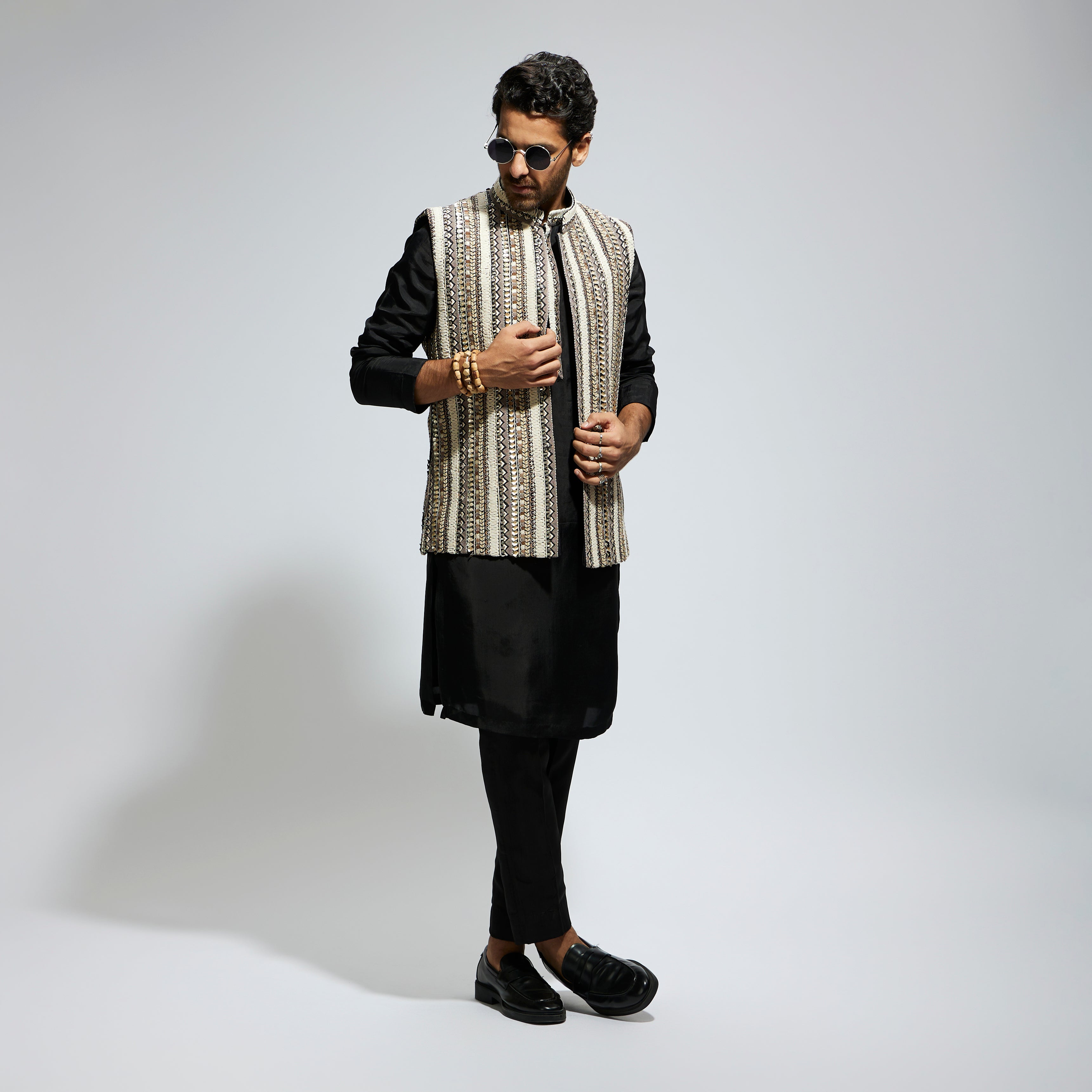 IVORY THREADWORK EMBELLISHED BUNDI
 PAIRED WITH KURTA AND PANTS