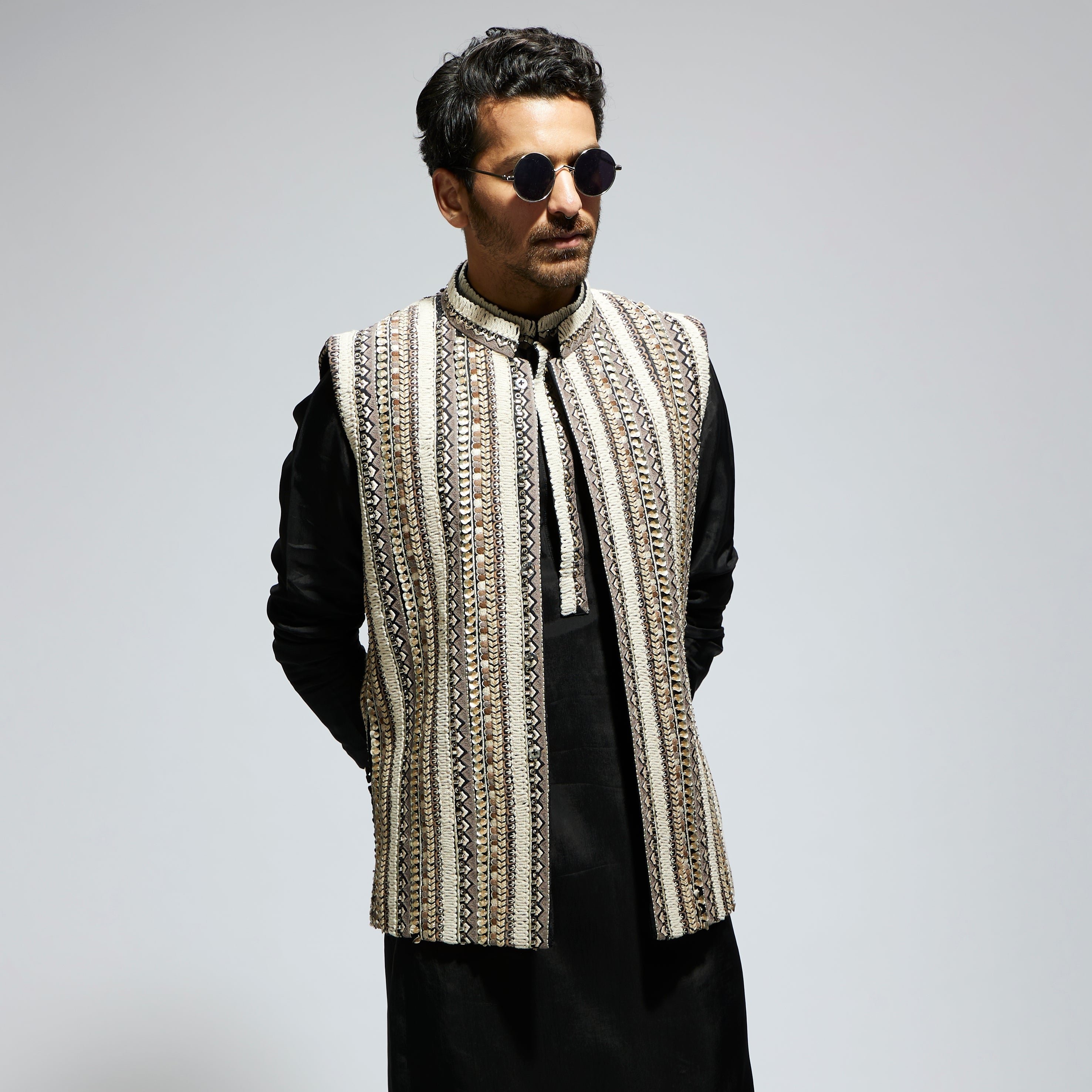 IVORY THREADWORK EMBELLISHED BUNDI
 PAIRED WITH KURTA AND PANTS