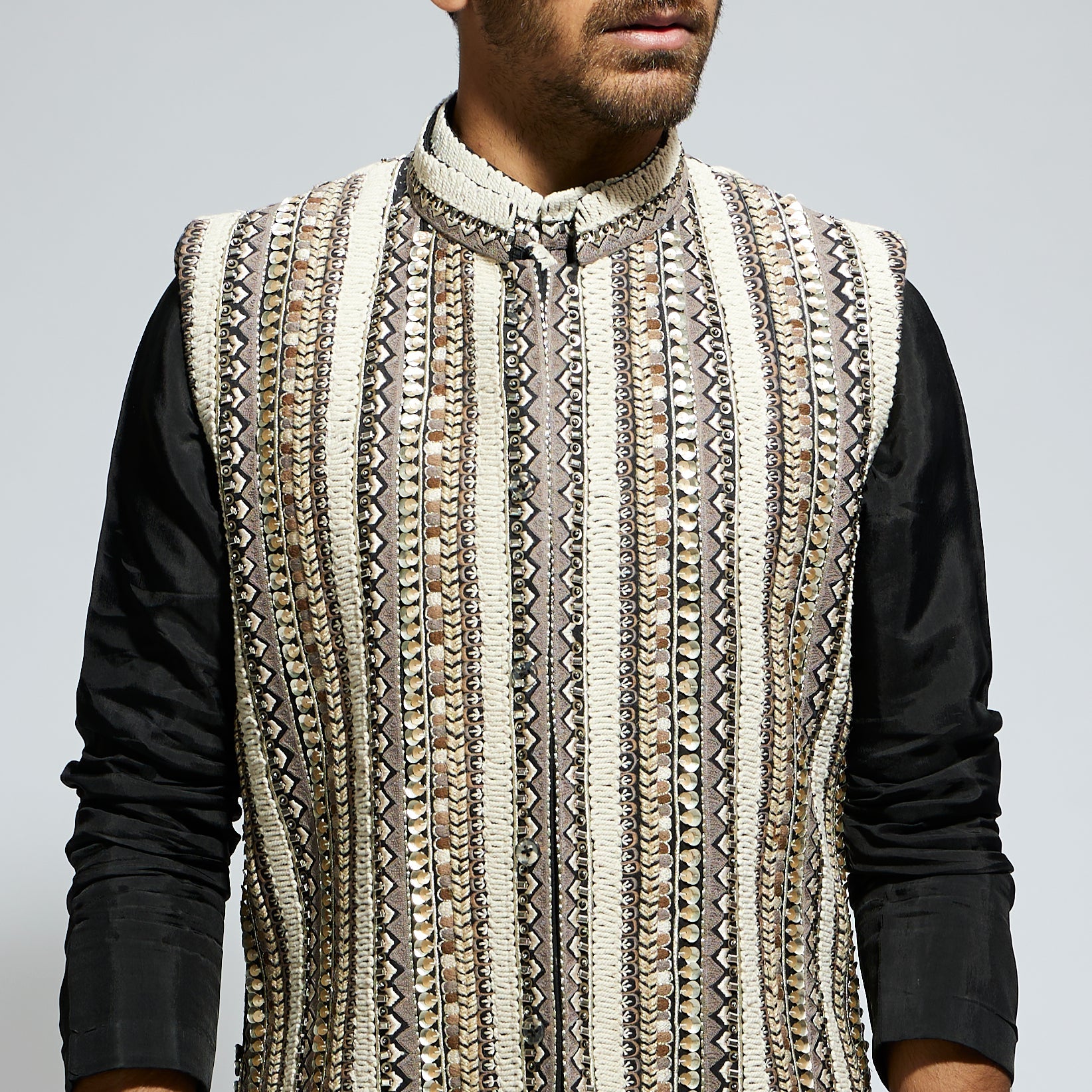 IVORY THREADWORK EMBELLISHED BUNDI
 PAIRED WITH KURTA AND PANTS