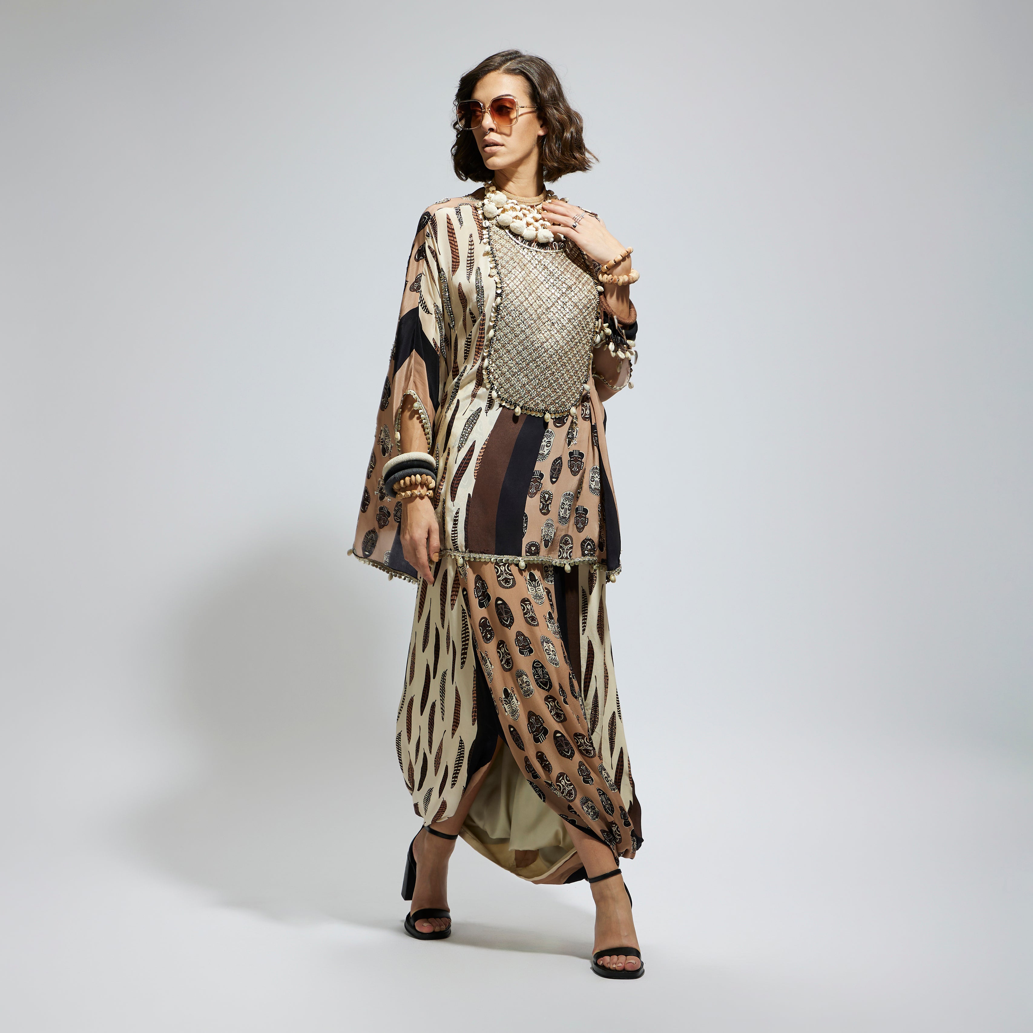 MASK AND FEATHER METALLIC EMBROIDERED YOKE SHORT KAFTAN PAIRED WTH DRAPE SKIRT