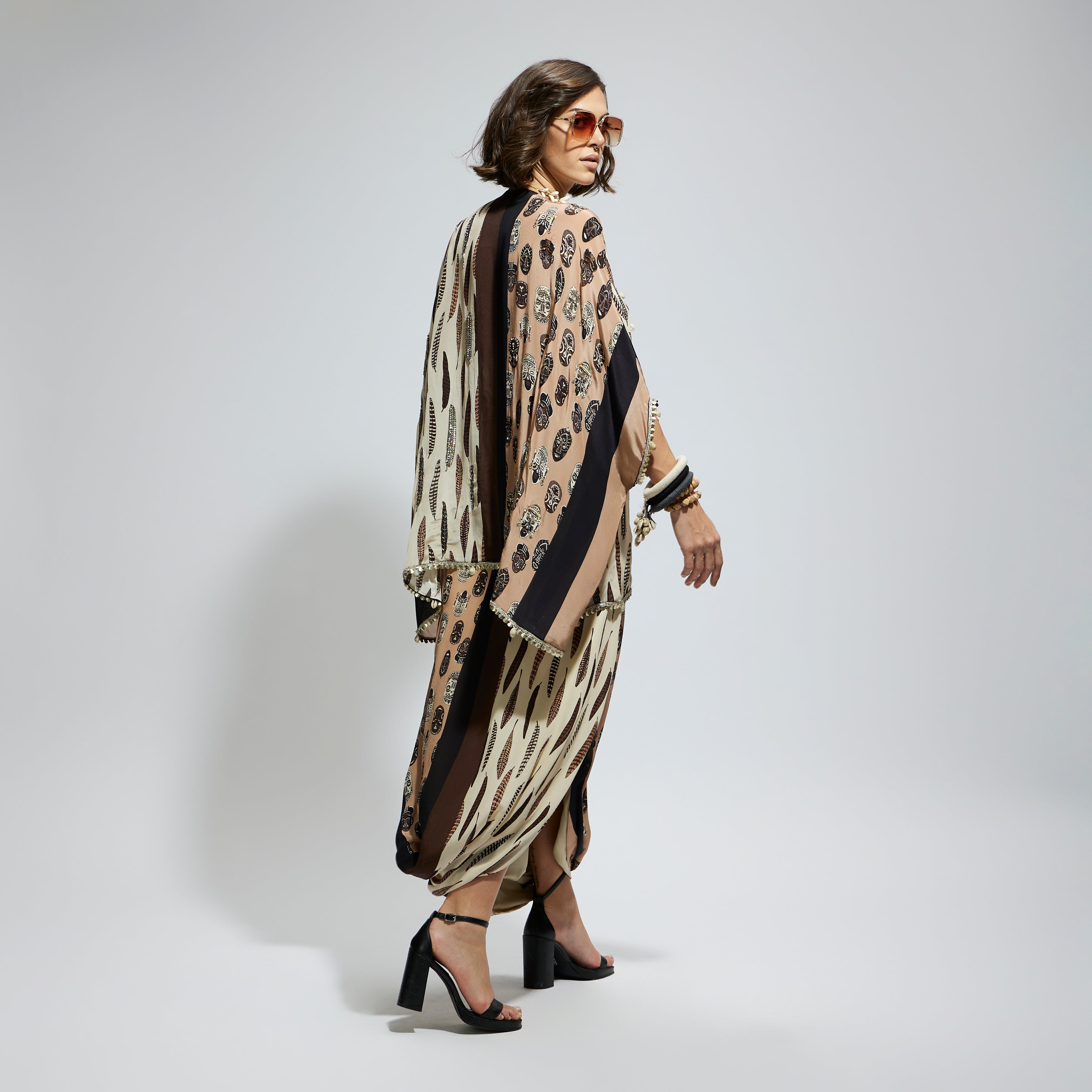 MASK AND FEATHER METALLIC EMBROIDERED YOKE SHORT KAFTAN PAIRED WTH DRAPE SKIRT