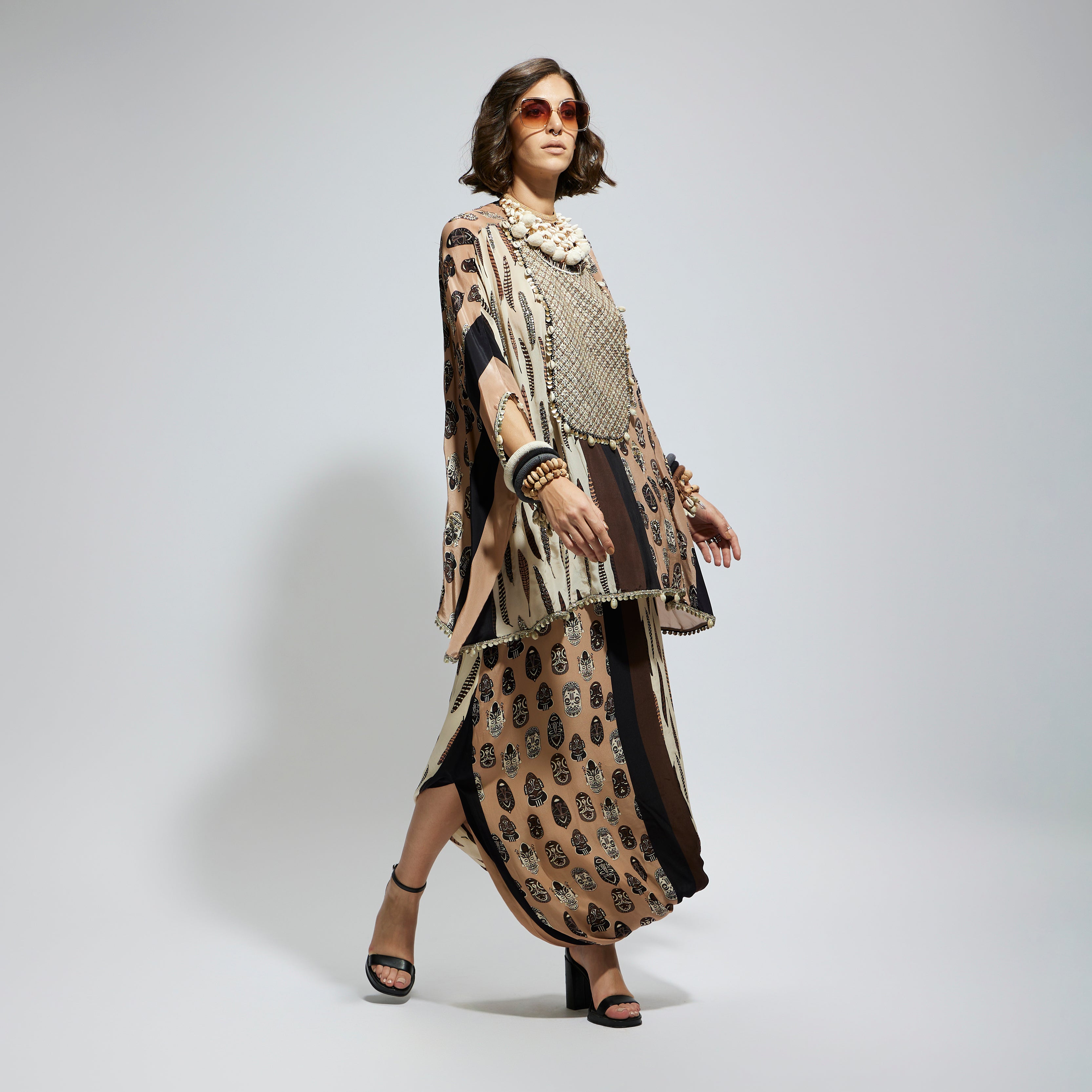 MASK AND FEATHER METALLIC EMBROIDERED YOKE SHORT KAFTAN PAIRED WTH DRAPE SKIRT