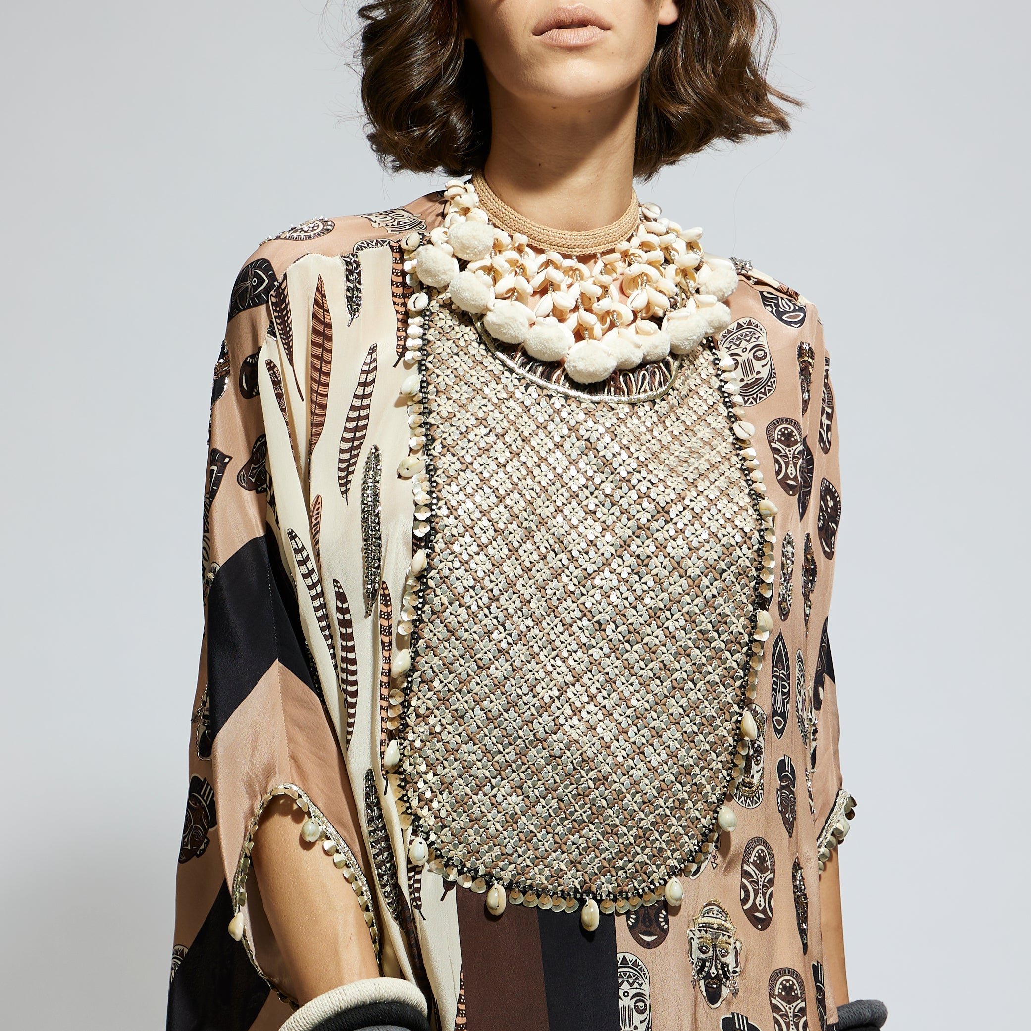 MASK AND FEATHER METALLIC EMBROIDERED YOKE SHORT KAFTAN PAIRED WTH DRAPE SKIRT