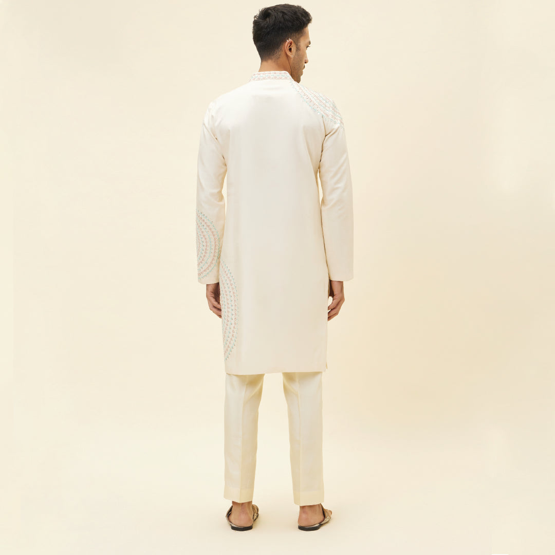 BEIGE KURTA WITH BUTTA EMBROIDERY WITH PANTS