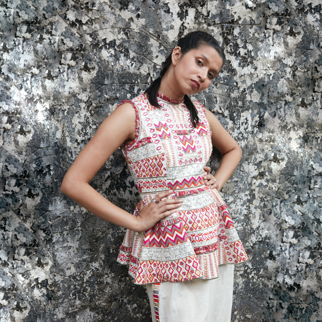 IVORY EMBELLISHED MULTI HUED PEPLUM TEAMED WITH PANTS