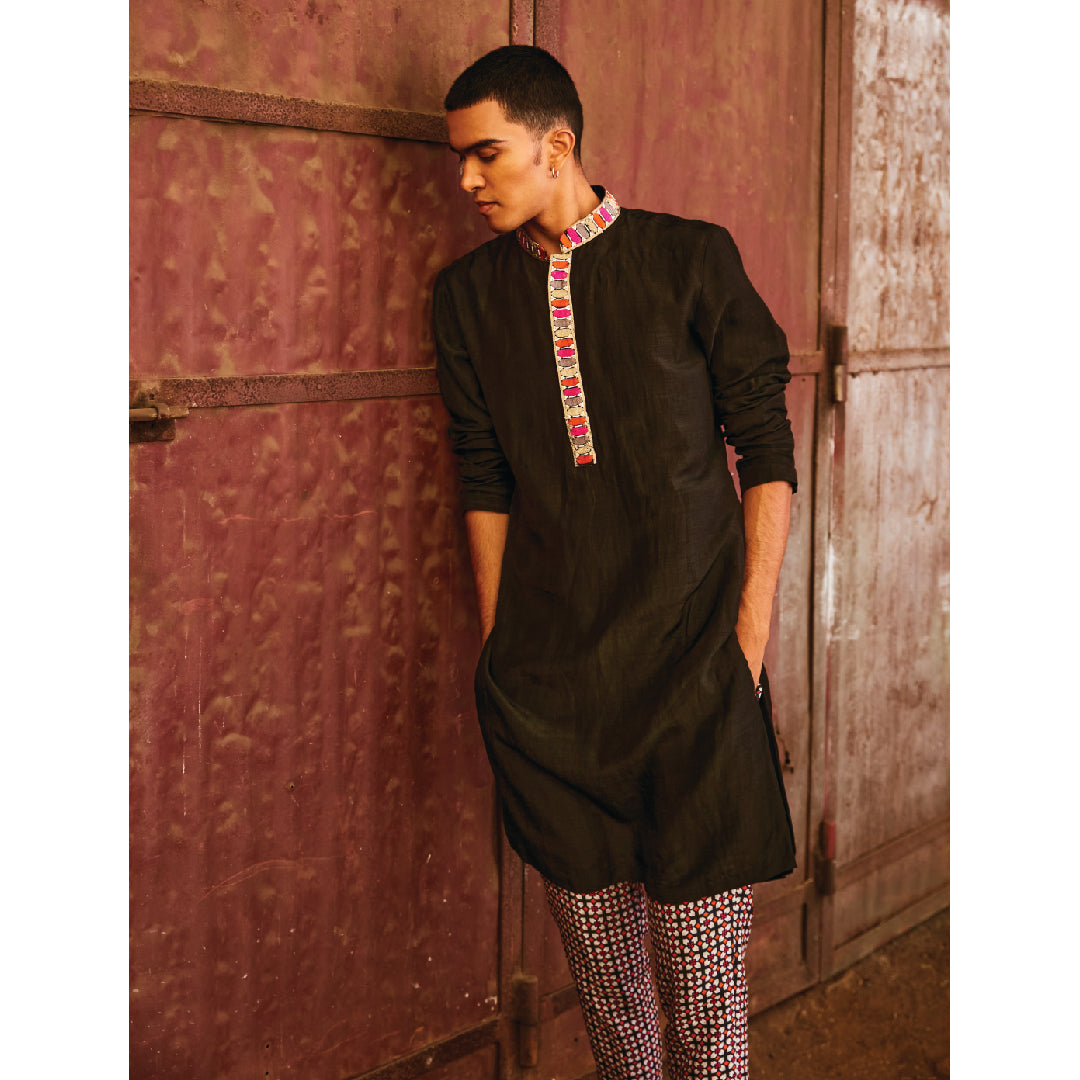 BLACK KURTA WITH HIGHLIGHTES COLLAR AND KURTA PATTI TEAMED WITH PANTS