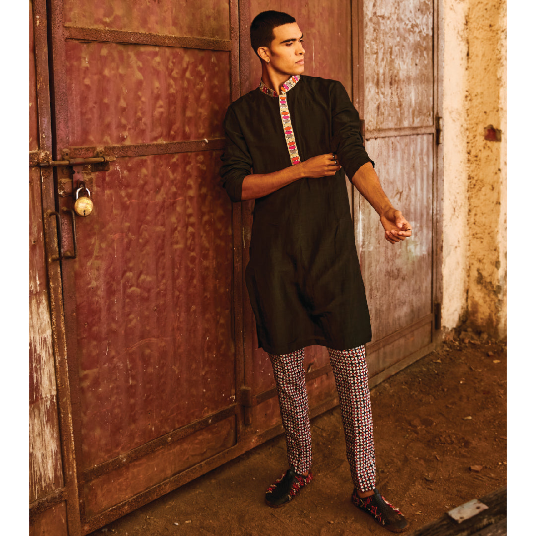 BLACK KURTA WITH HIGHLIGHTES COLLAR AND KURTA PATTI TEAMED WITH PANTS