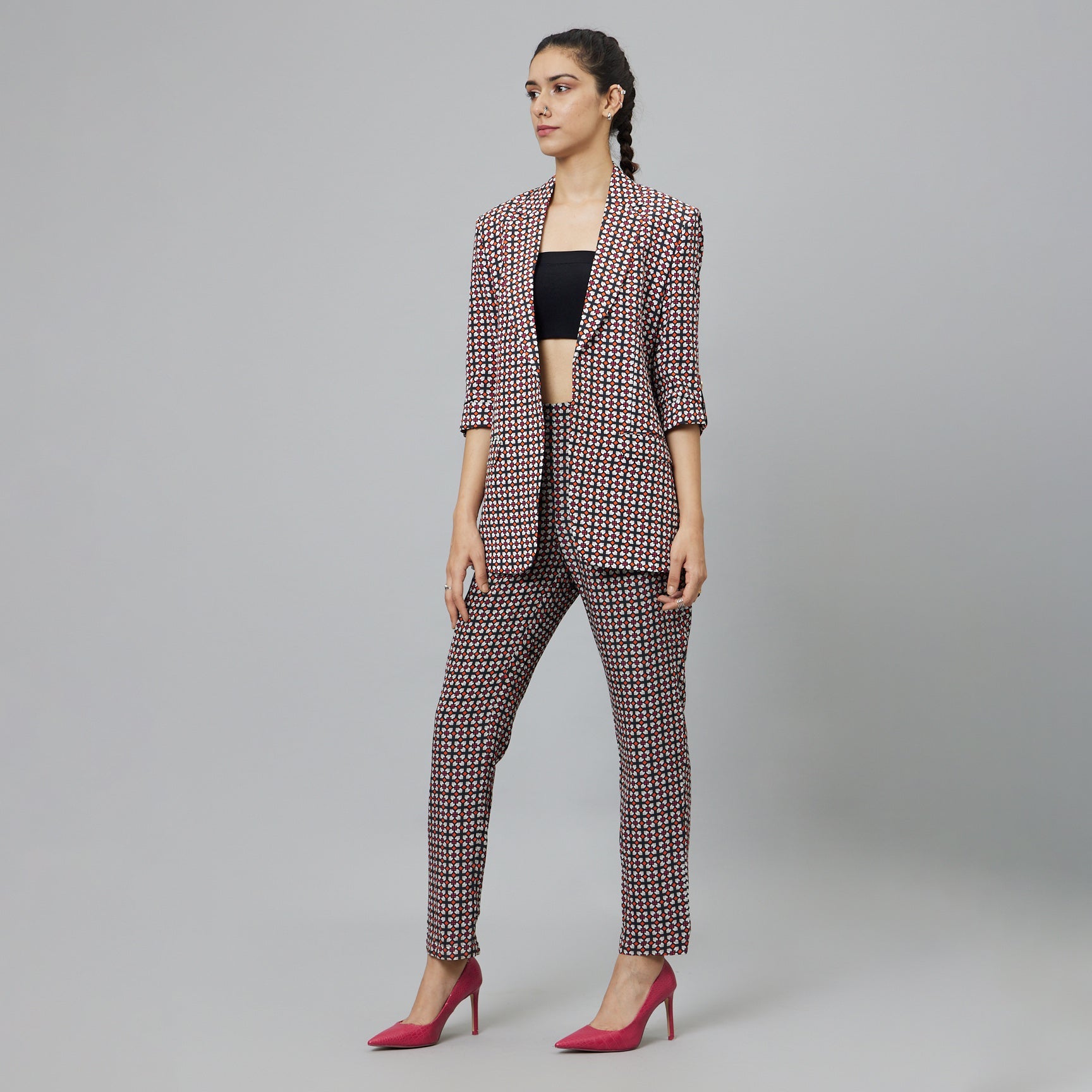 BLACK GEOMETRIC PRINT PANT SUIT PAIRED WITH A BUSTIER